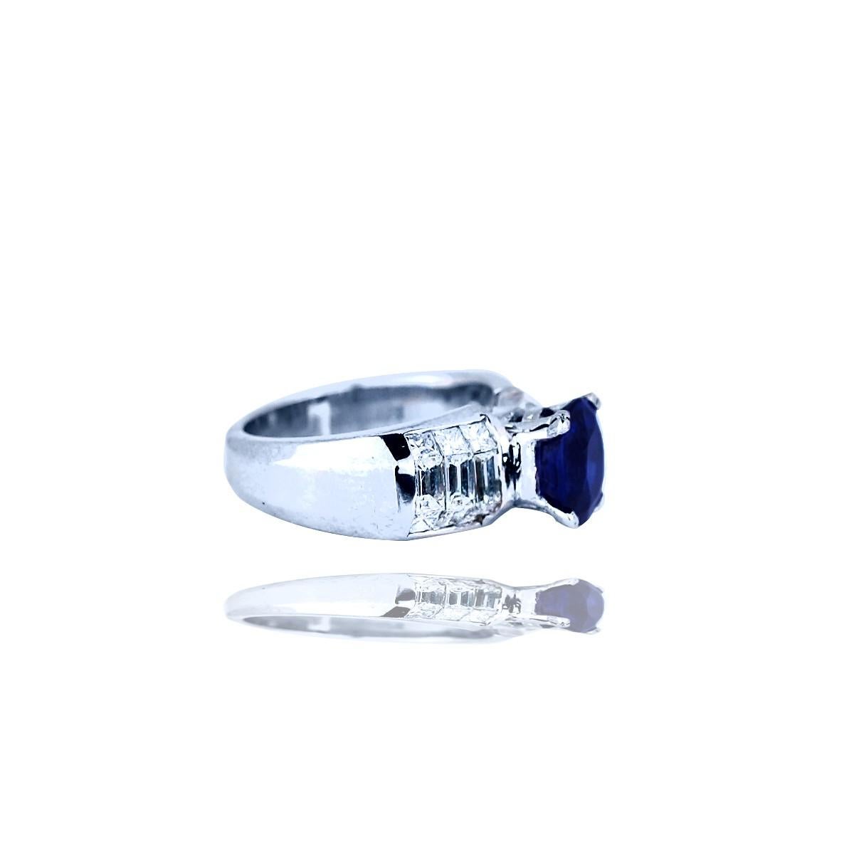 Contemporary, Invisible Diamond Ring with Oval Sapphire, Center Stone, 4.89 CTW 
The center Blue Sapphire is measured as 8.89-7.38 x 5.33 mm with estimated weight of 3.12 carat. The sapphire is lab grown from natural sapphire mineral 
Setting is a