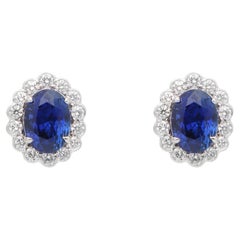 Boucles d'oreilles contemporaines en saphir ovale de 5,10 carats et diamants, avec bord festonné