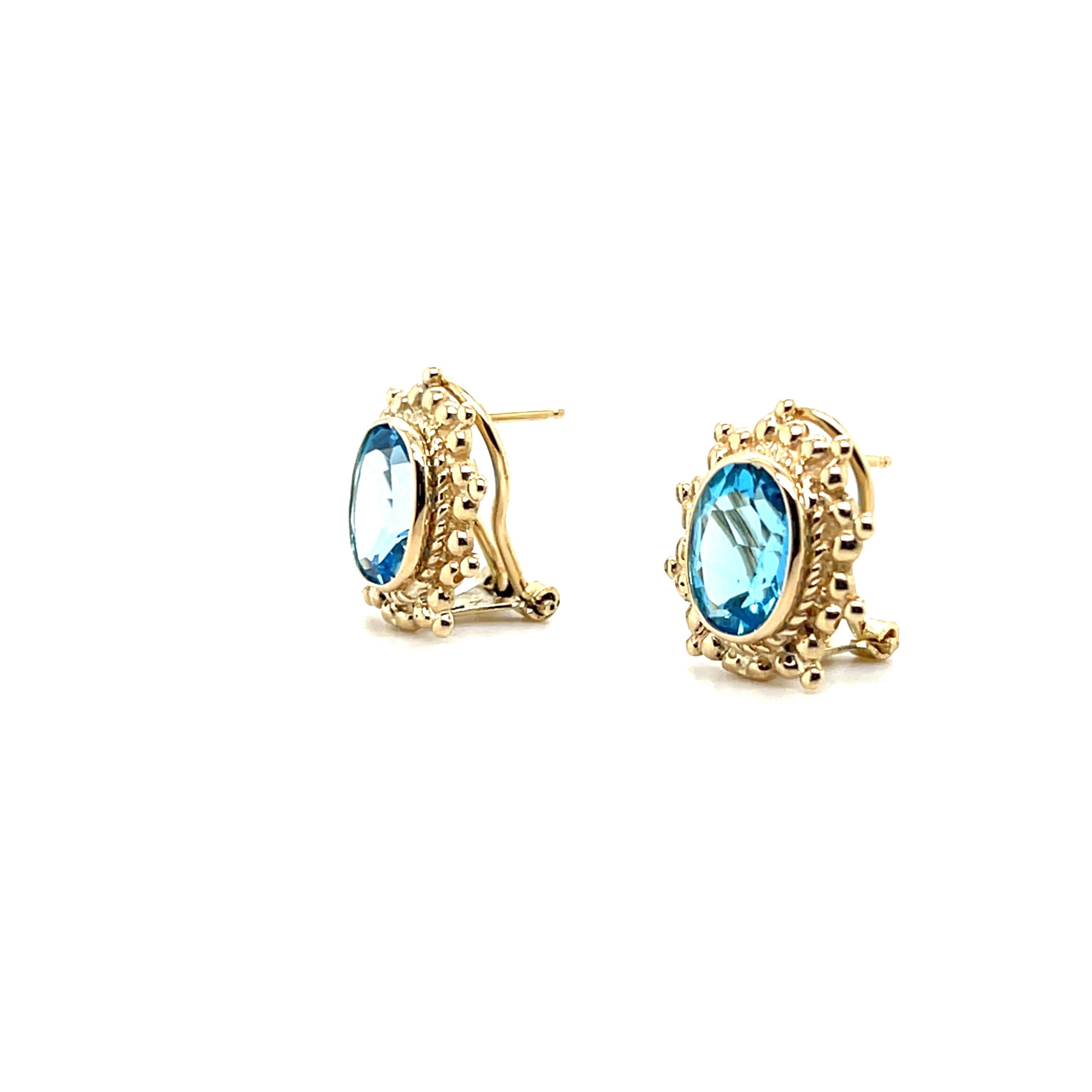 Orecchini Omega Back in oro giallo 14 carati con 5,24 carati di topazio blu In condizioni buone in vendita a Towson, MD