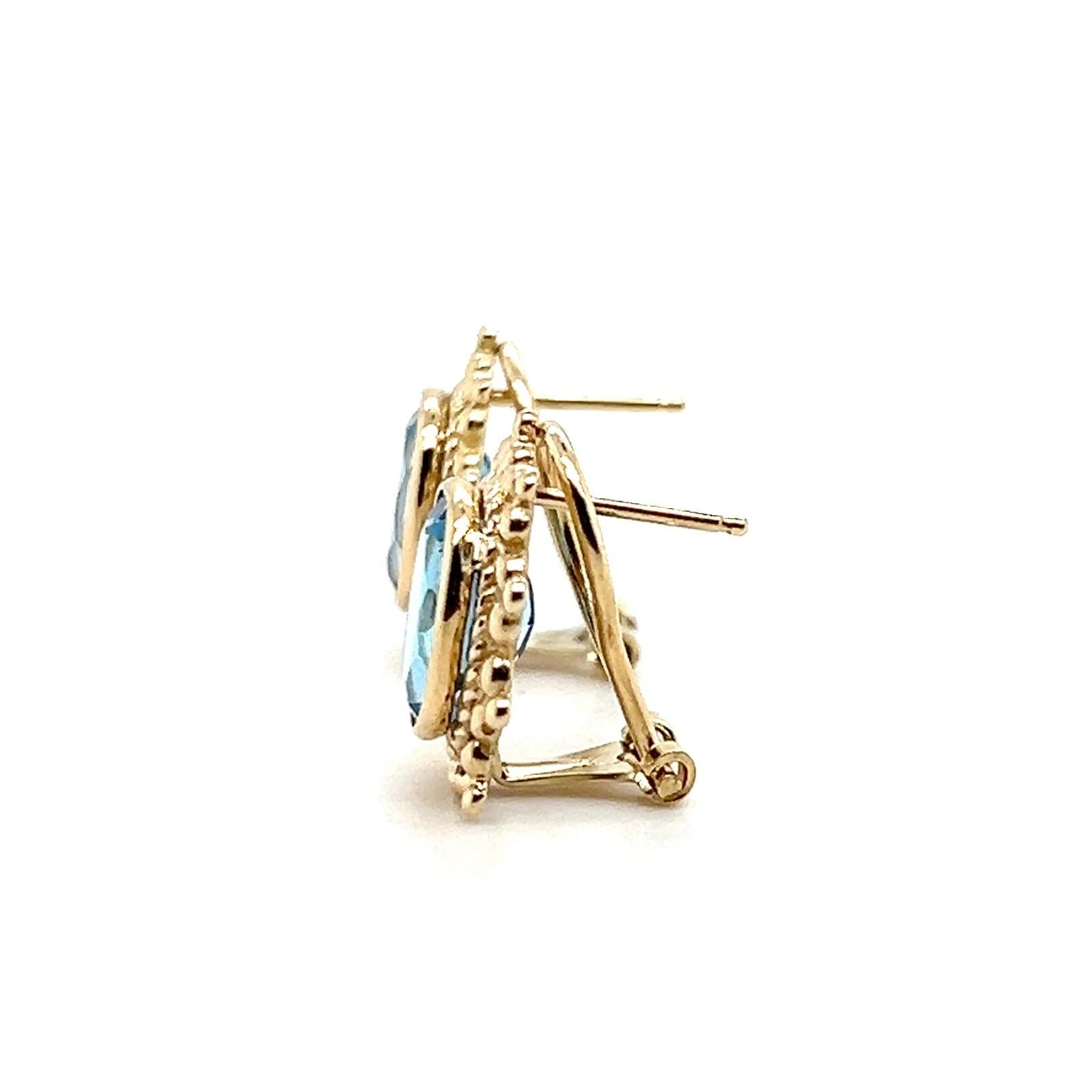 Orecchini Omega Back in oro giallo 14 carati con 5,24 carati di topazio blu in vendita 1