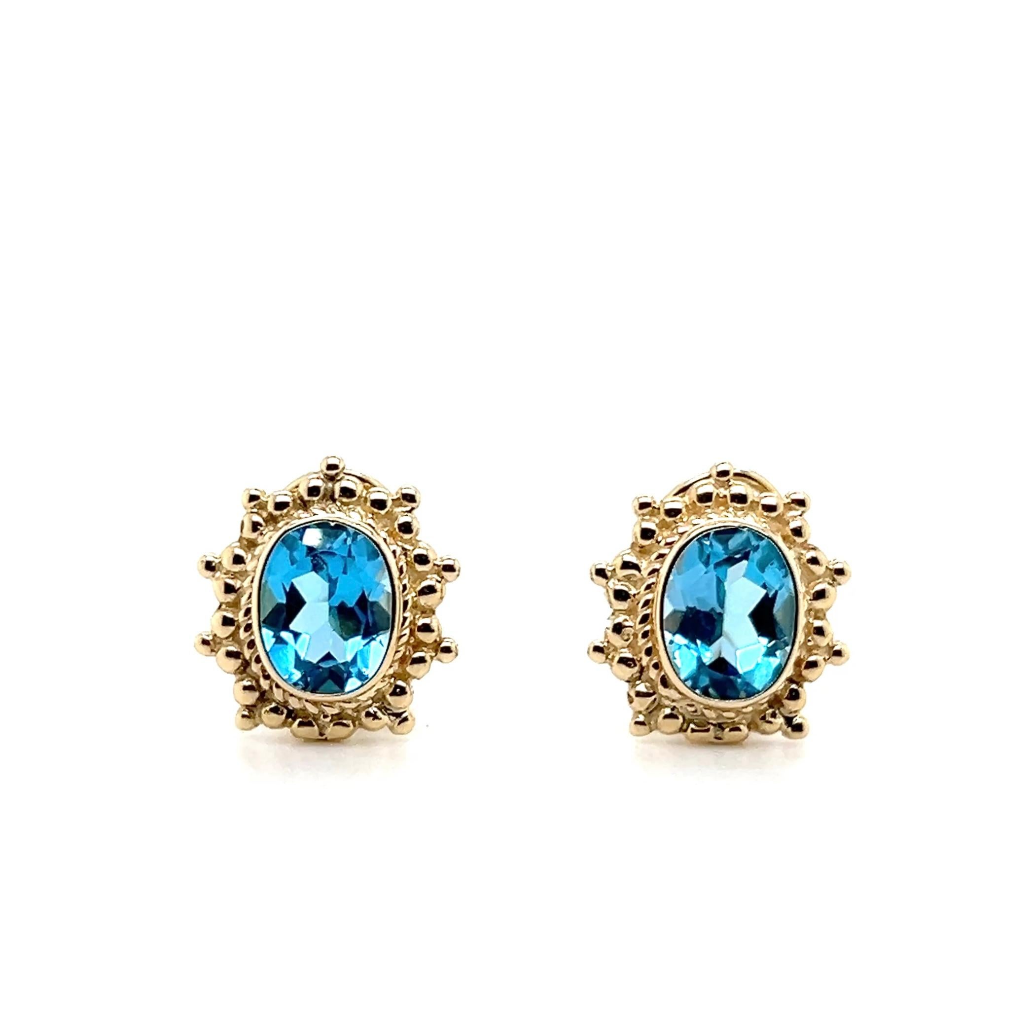 Orecchini Omega Back in oro giallo 14 carati con 5,24 carati di topazio blu in vendita