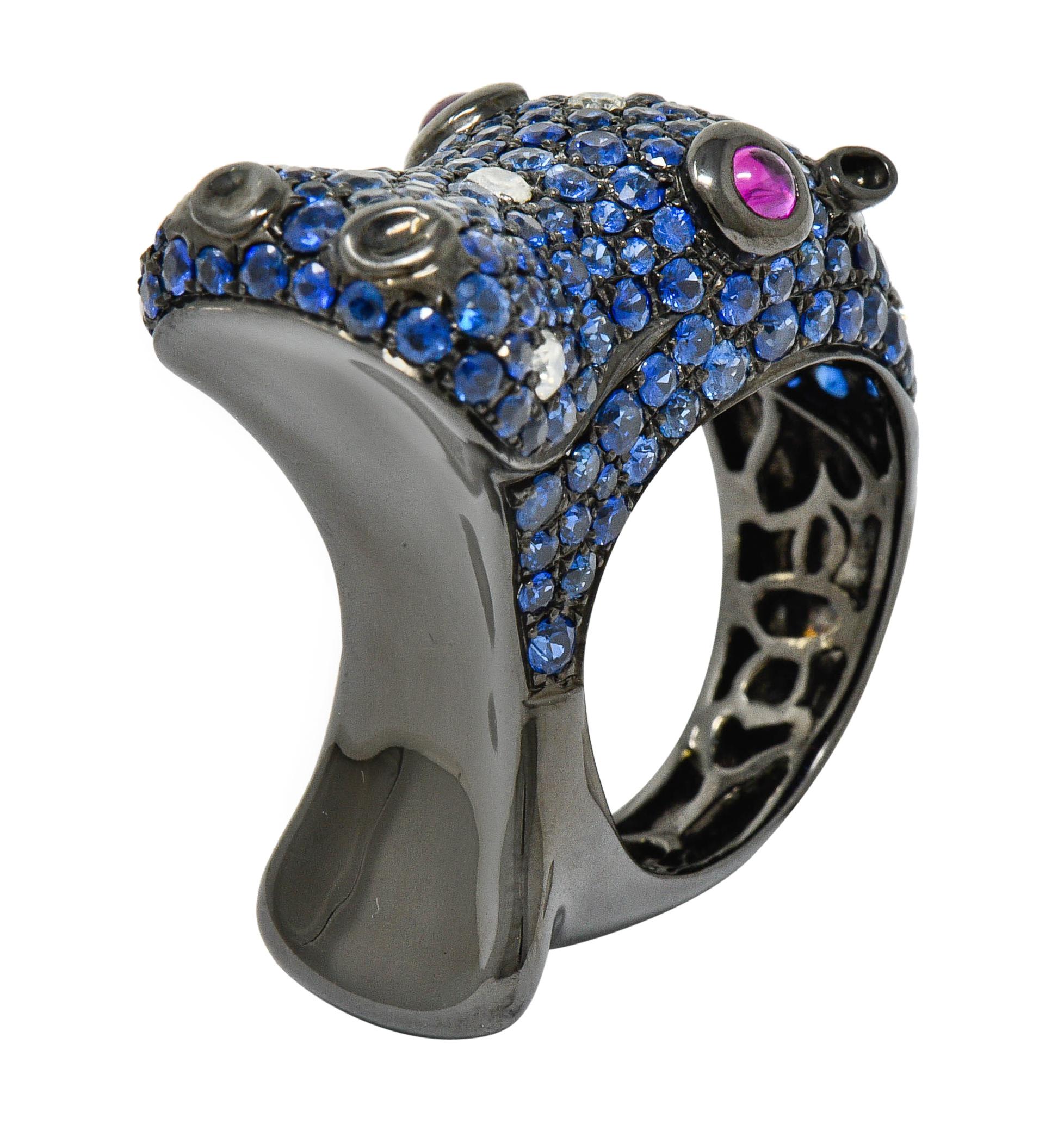 Designed as an open mouthed hippopotamus with a gleaming black rhodium finish

Mouth creates a unique comfortable fit to adjacent finger

Pavè set throughout by round cut sapphire, bright blue in color, and weighing 4.63 carats total

With round