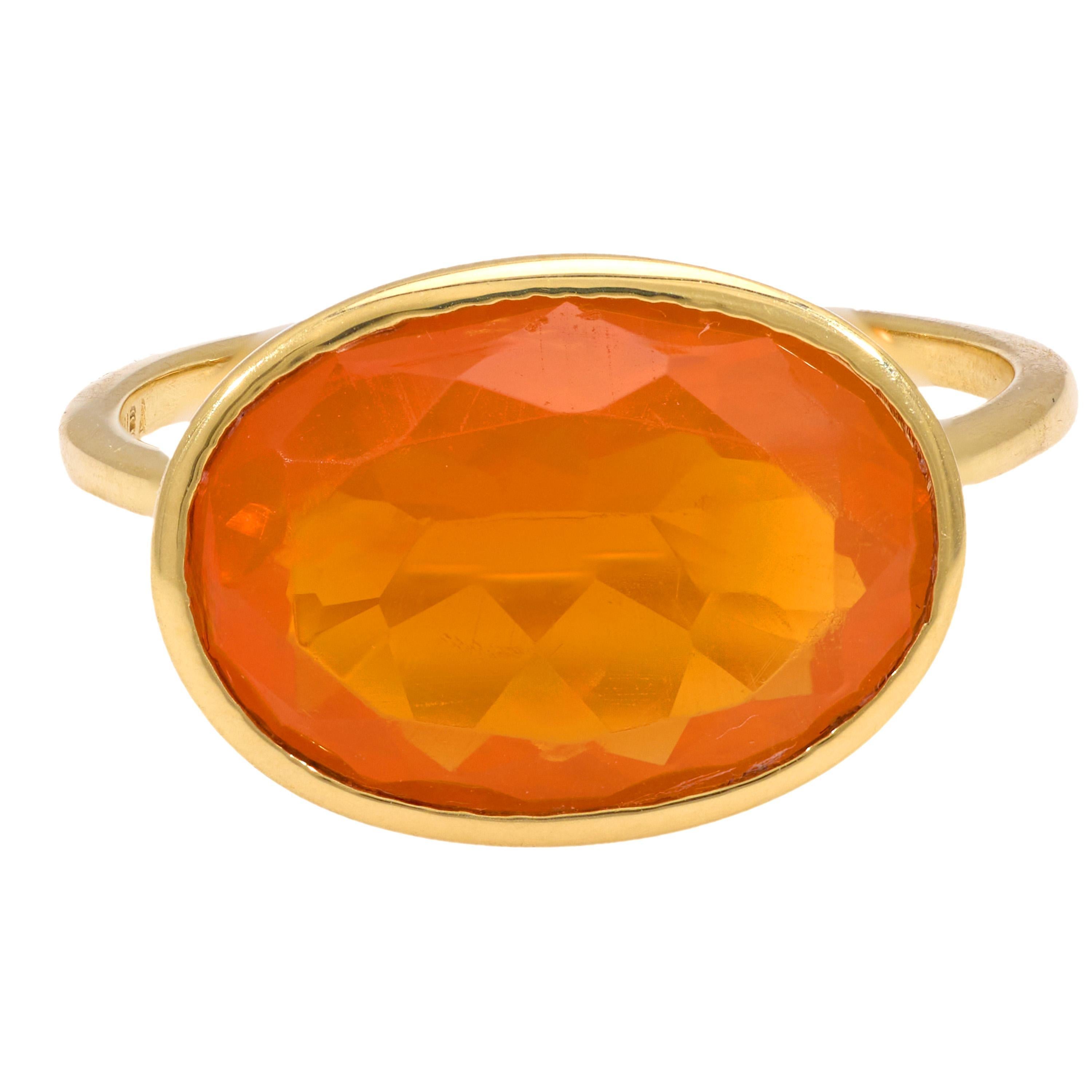 Oval Cut Contemporary 5.50 carat fire opal 18k yellow gold bezel ring For Sale