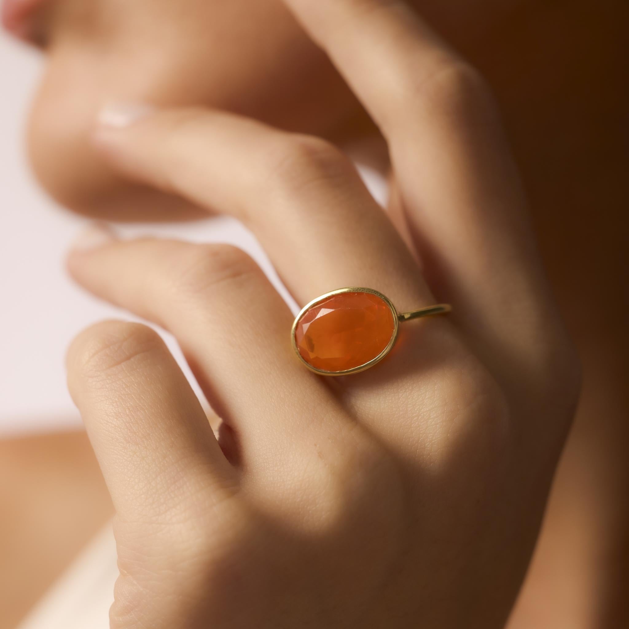 Contemporary 5.50 carat fire opal 18k yellow gold bezel ring In Excellent Condition For Sale In Beverly Hills, CA