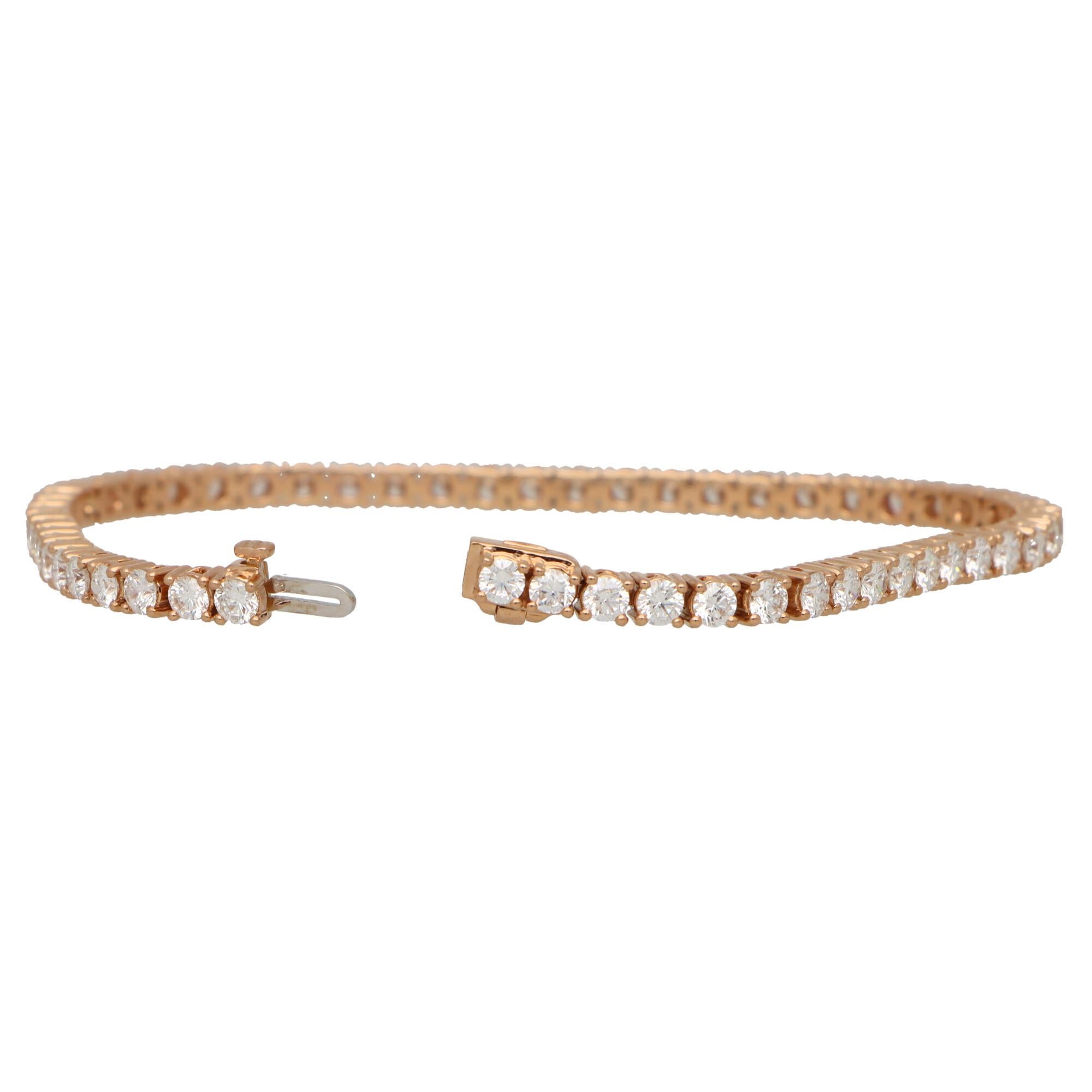 A lovely contemporary diamond line bracelet set in 18k rose gold.

The bracelet is composed of a grand total of 55 round brilliant cut sparkly diamonds, all of which are claw set securely. 

Due to the links being articulated, this allows the