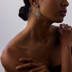 Contemporary 6.40 carat diamond emerald platinum cocktail earrings