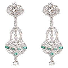 Contemporary 6.40 carat diamond emerald platinum cocktail earrings