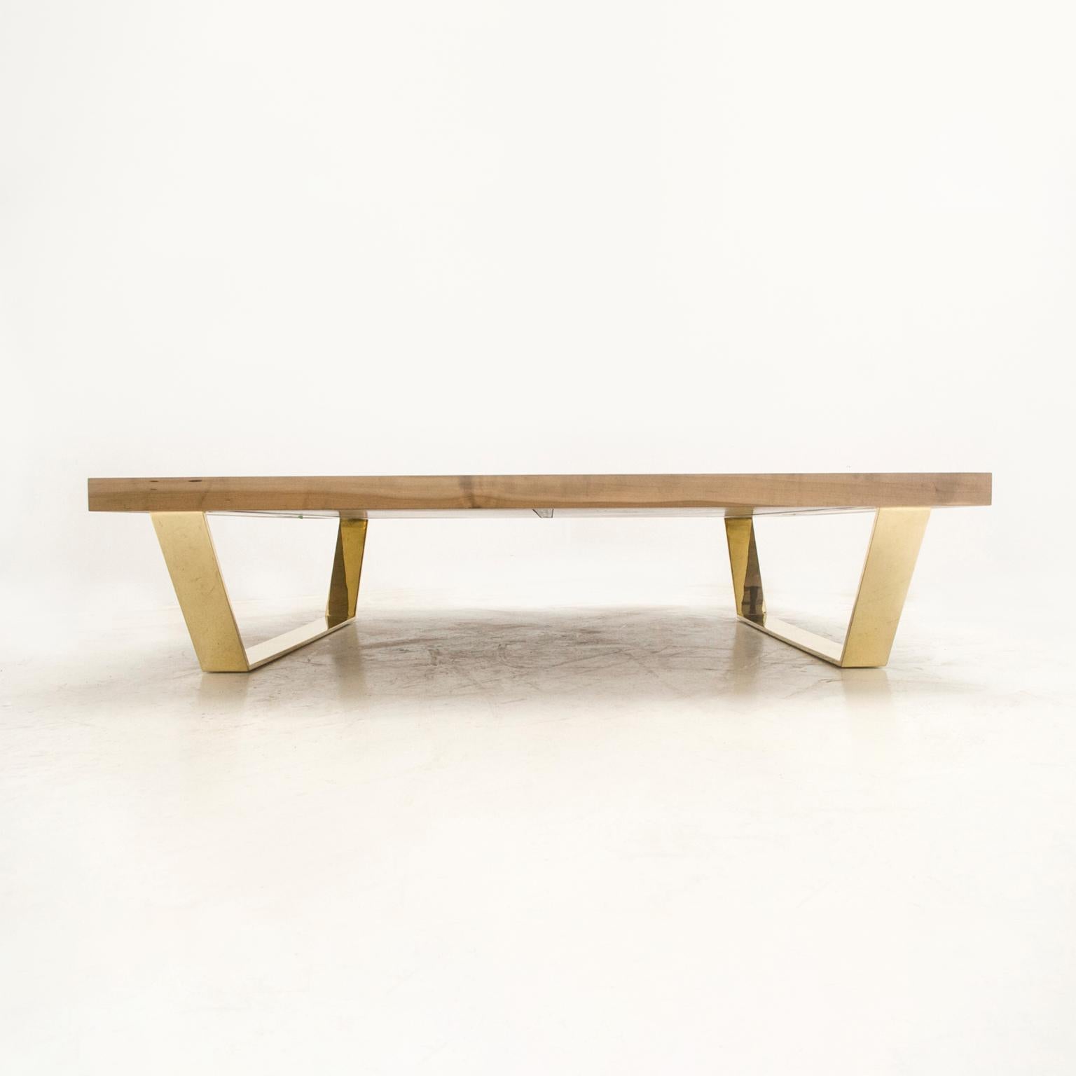 The 65 x 65 low table pairs a lacquer-sealed, solid oxidized domestic hardwood tabletop and a trapezoidal plated-steel leg. Metal stitch joints reinforce the hardwood.

STACKLAB’s controlled oxidation process naturally modifies the wood’s color,