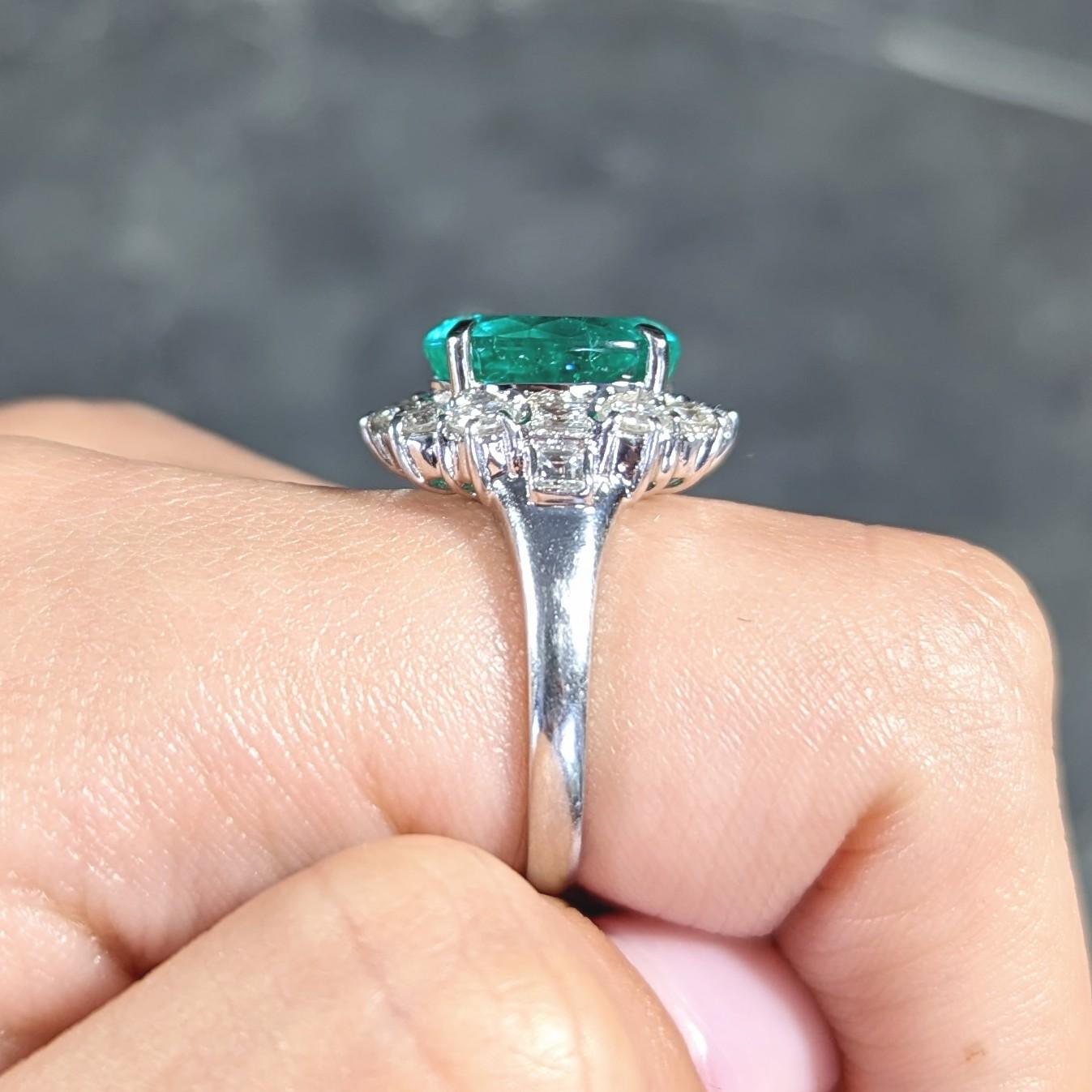 Contemporary 6.77 CTW Columbian Emerald Diamond Platinum Halo Ring GIA 7