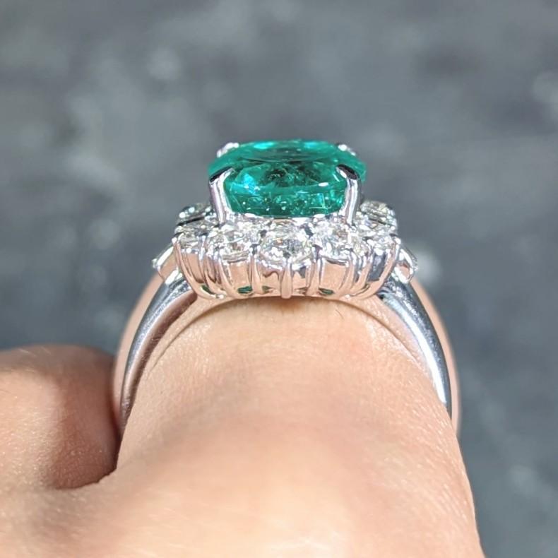 Contemporary 6.77 CTW Columbian Emerald Diamond Platinum Halo Ring GIA 8