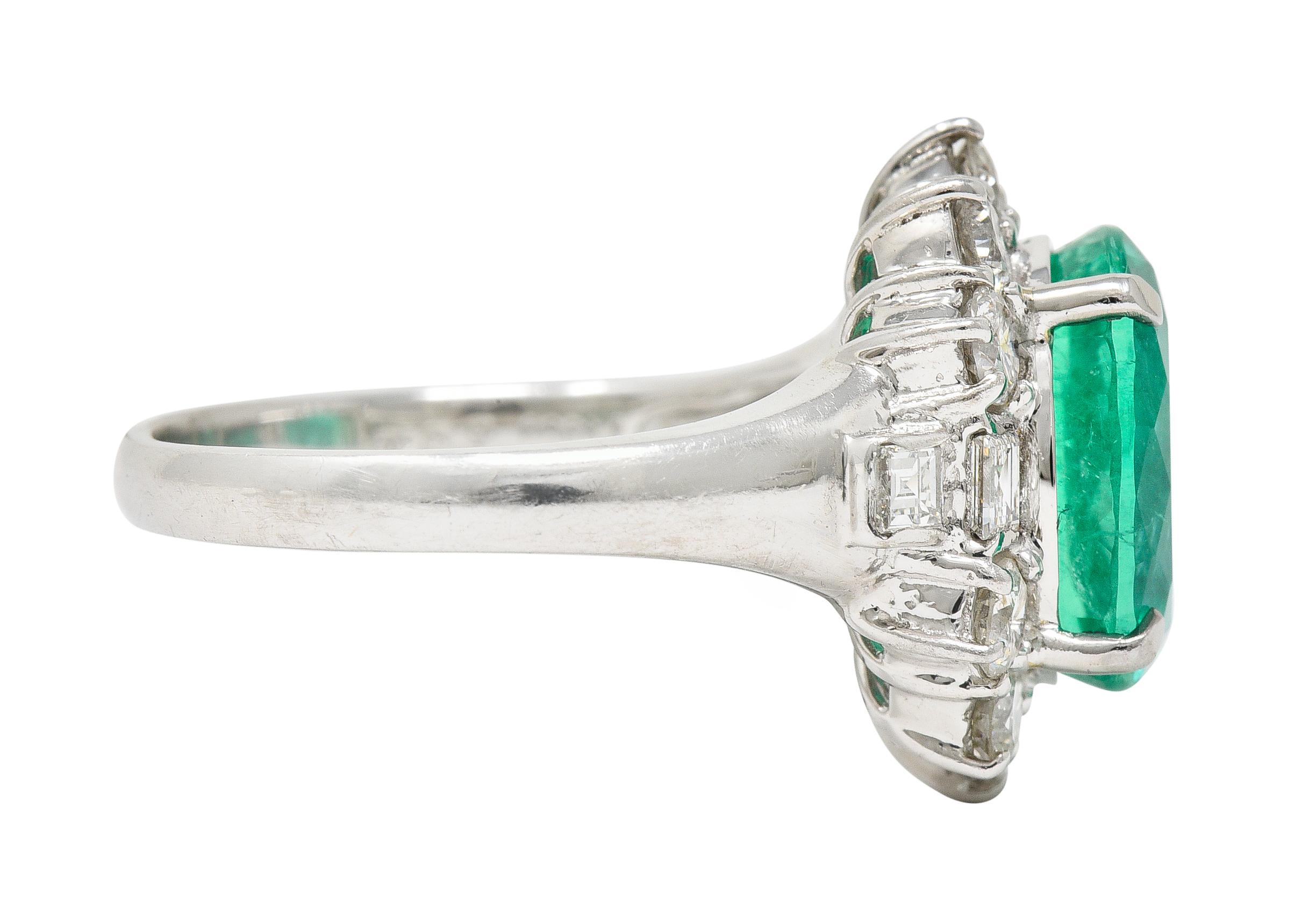 Oval Cut Contemporary 6.77 CTW Columbian Emerald Diamond Platinum Halo Ring GIA