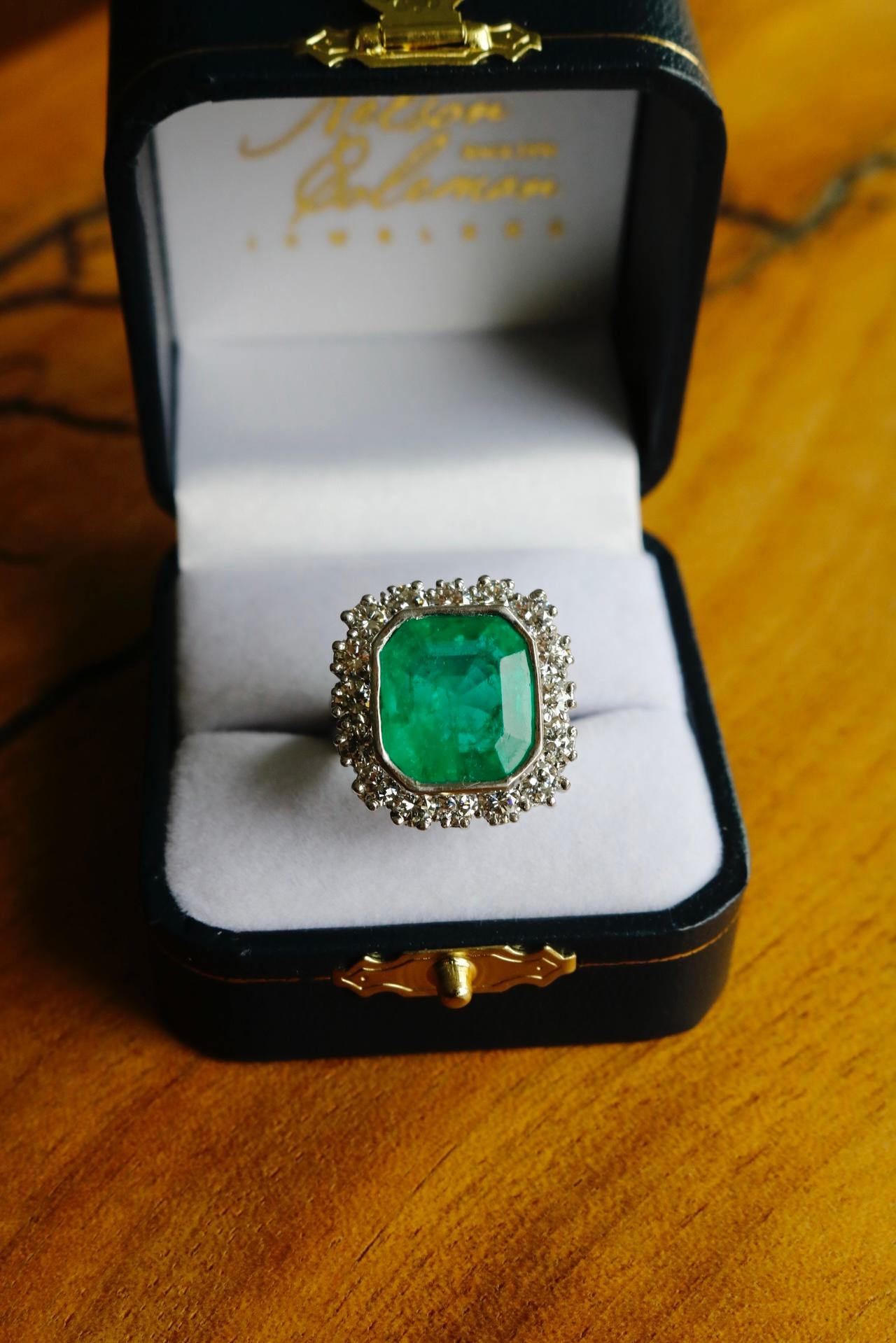 This striking platinum cocktail ring showcases a truly rare and impressive step-cut emerald weighing approximately 6.79 carats. Emeralds of this size and quality are increasingly difficult to source, making this piece a standout addition to any fine