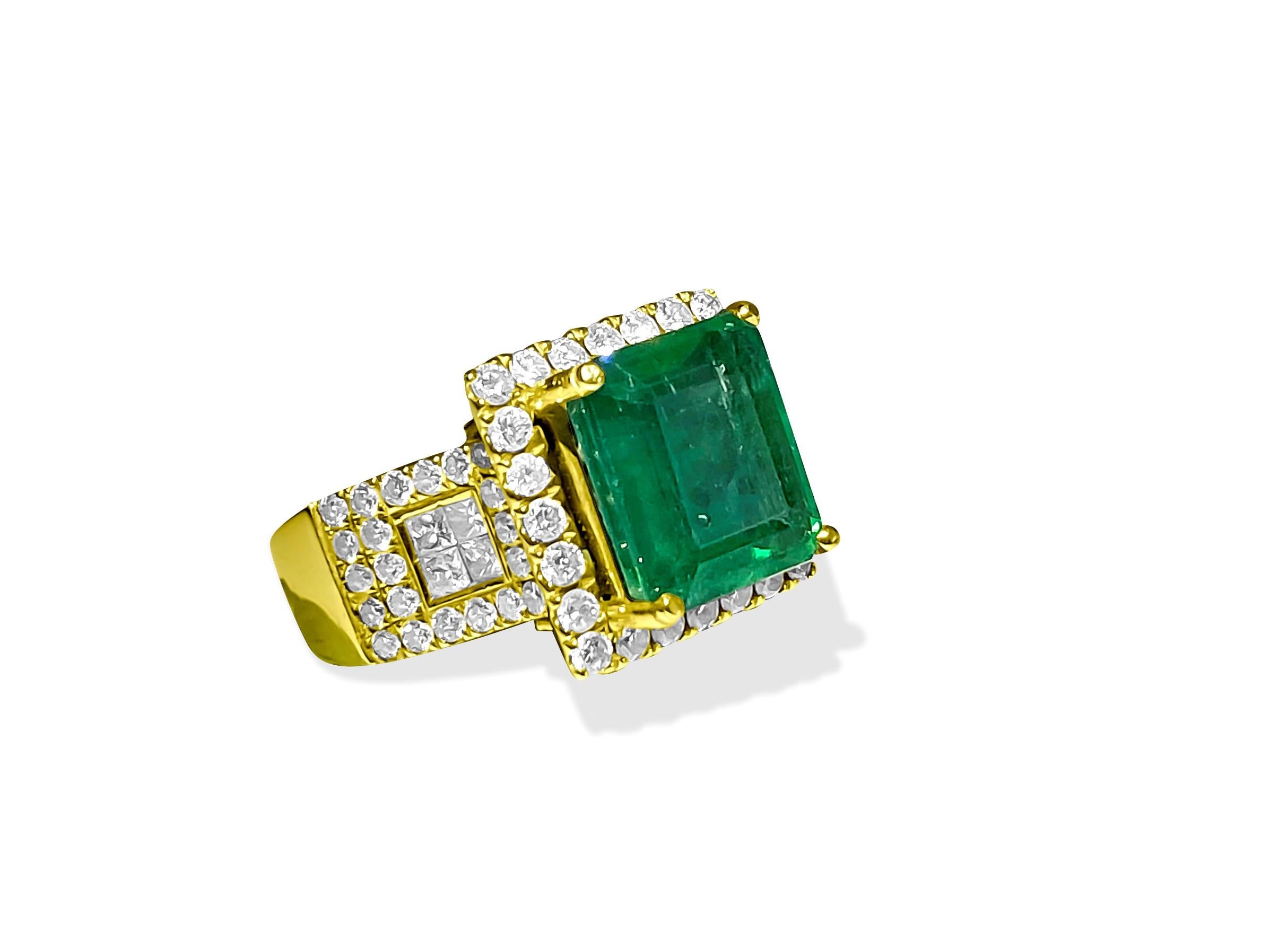 A pretty ring made of 14-karat yellow gold with a 5.50-carat emerald and 2.00 carats of diamonds. The emerald and diamonds are real and mined from the earth, with the diamonds being clear and colorless. The ring is stunning and can be resized.

Key