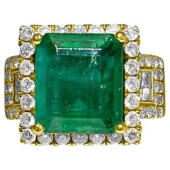 Used Contemporary 7.50 Carat Diamond Emerald Ring.