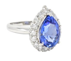Contemporary 7.54 CTW Pear Cut Tanzanite Diamond Platinum Halo Ring