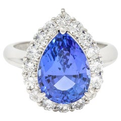 Contemporary 7.54 CTW Pear Cut Tanzanite Diamond Platinum Halo Ring