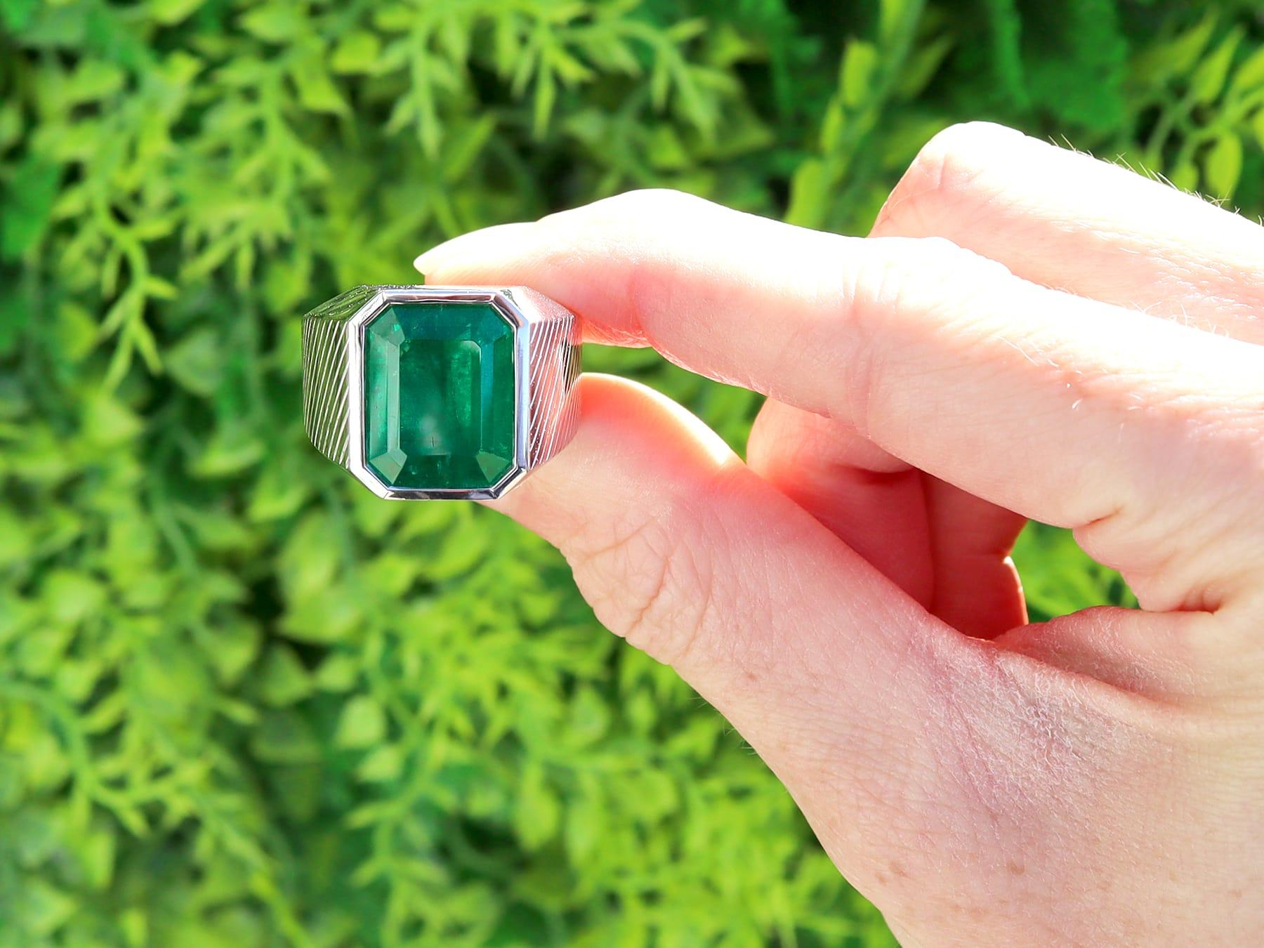A stunning, fine and impressive 7.73 carat emerald and 18 karat white gold dress ring; part of our diverse jewelry and estate jewelry collections.

This stunning, fine and impressive emerald ring has been crafted in 18k white gold.

The substantial