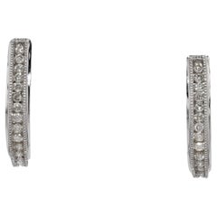 Contemporary .80 Carat Diamond Oval Hoop Earrings