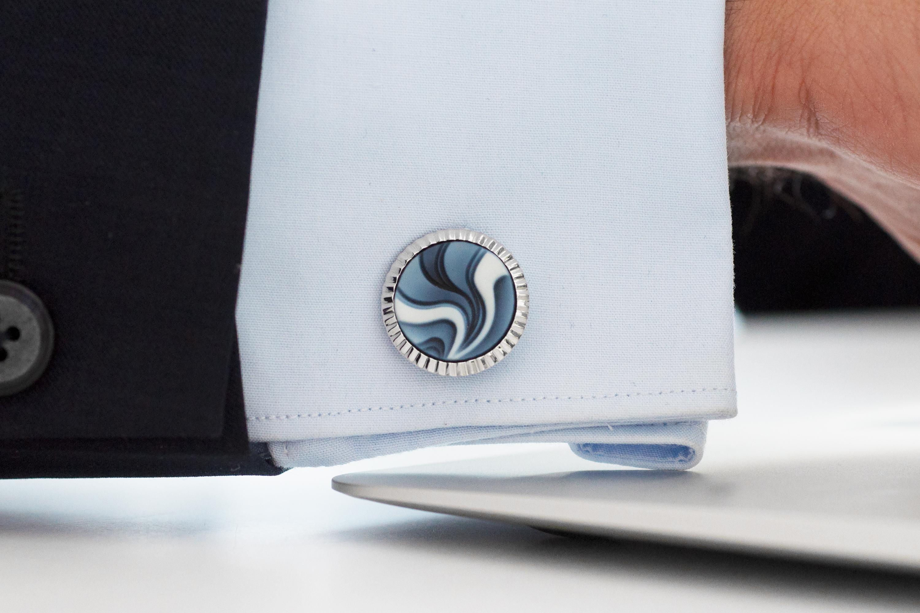 These exquisite pair of contemporary abstract agate cameo carving cufflinks made in sterling silver is delight for the wearer! Hand carved in the relief of a natural agate these unisex cufflinks are a contemporary expression for the modern man or