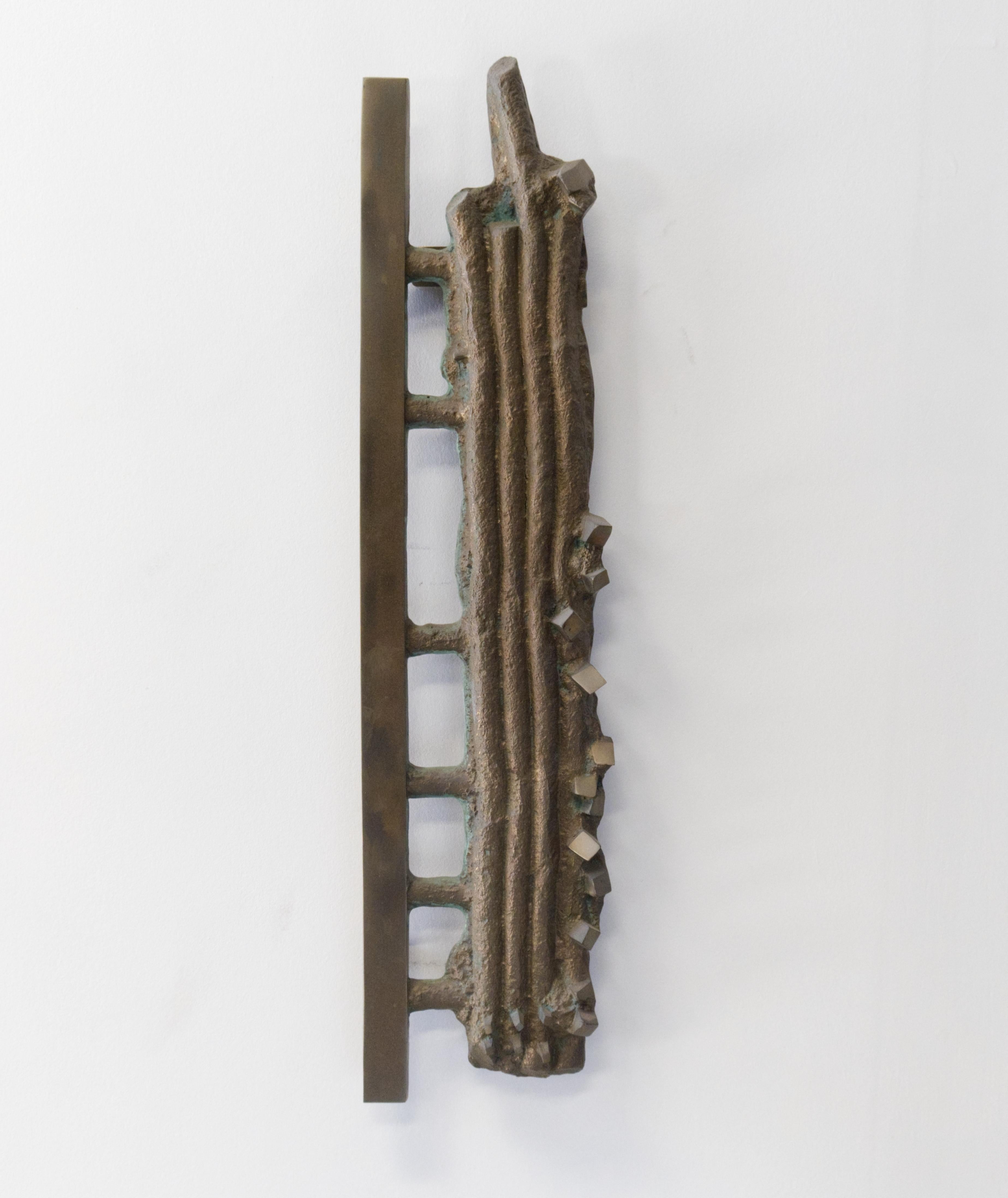 Crystal Algorithm is a metal wall sculpture that serves as a portal to another world, inviting viewers to imagine what lies beyond. Handcrafted from cast bronze with a traditional aging patina, the piece combines organic textures and precise