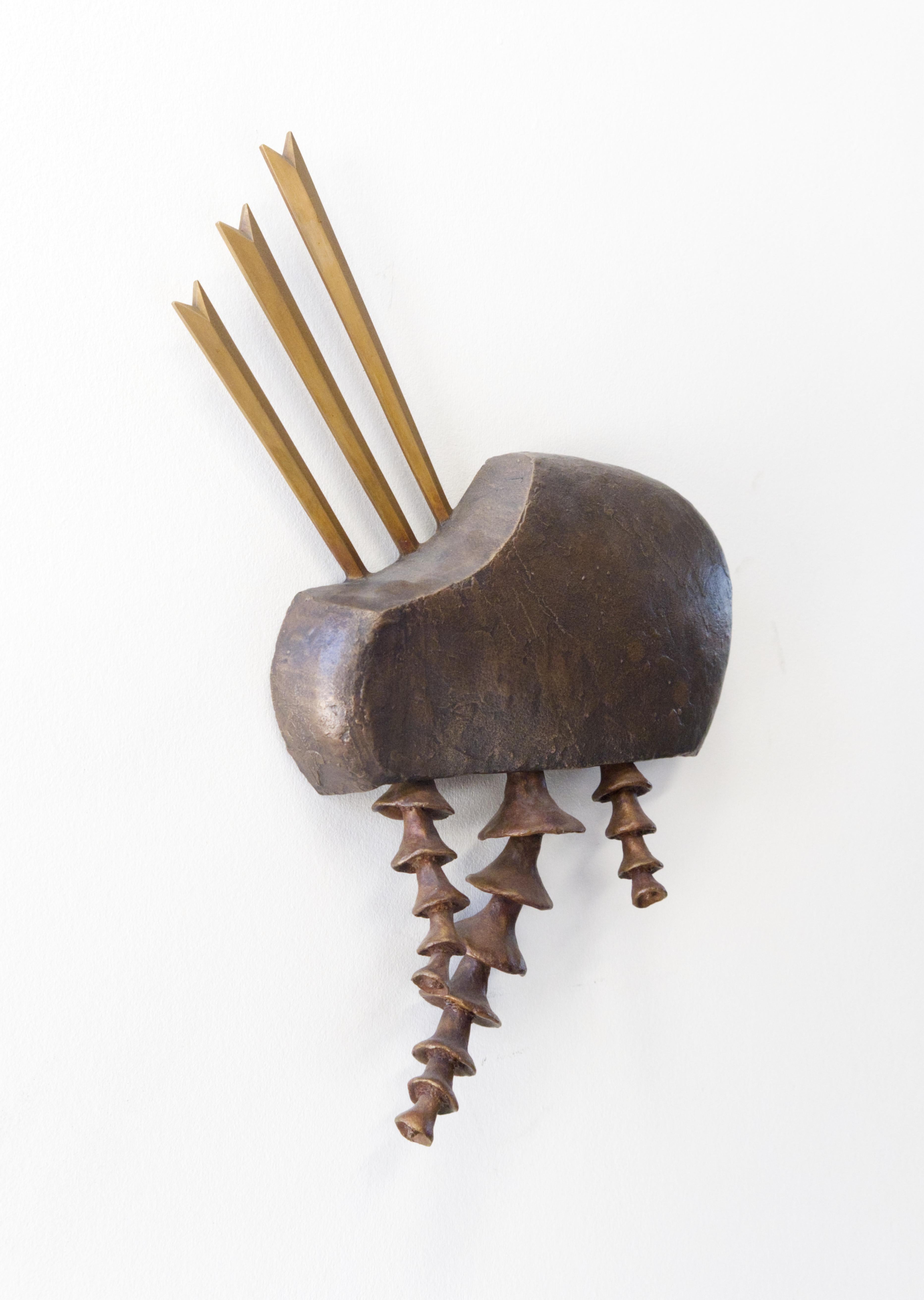 Notional Generator marks the first in the Idea Machines series, a collection exploring the abstract process of thought generation. This bronze wall sculpture, crafted through the lost wax casting method, uses varied textures and patinas to bring a