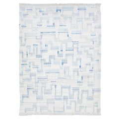Alfombra de lana de tejido plano kilim abstracto contemporáneo en marfil y azul