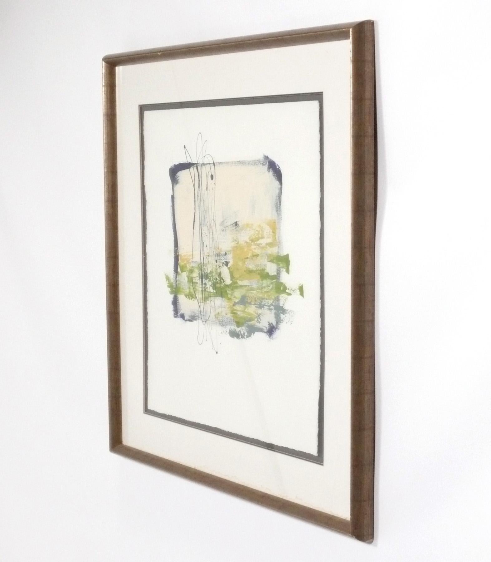 Contemporary abstract painting, American, circa 2000s. Beautiful abstract painting in shades of blues and greens, framed in a silvered wooden frame.