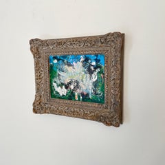 Quadro astratto contemporaneo a più colori incorniciato in una cornice antica