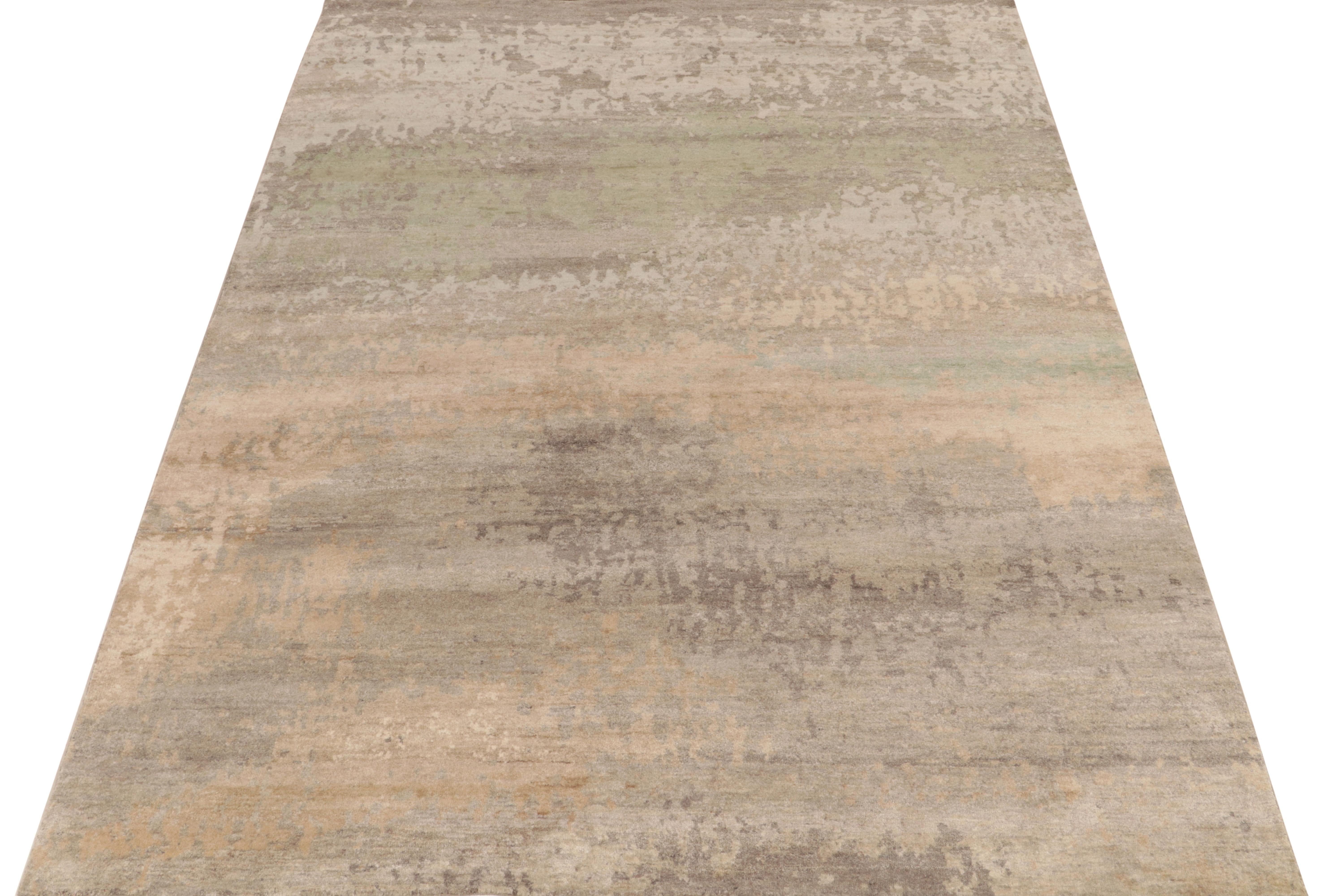 Hand-knotted in fabulous all-natural silk, a glorious 7x10 piece from Rug & Kilim’s modern selections. The contemporary area rug bears gorgeous painterly attitude in polychromatic tones of gray, beige & green joyfully blended in abstract