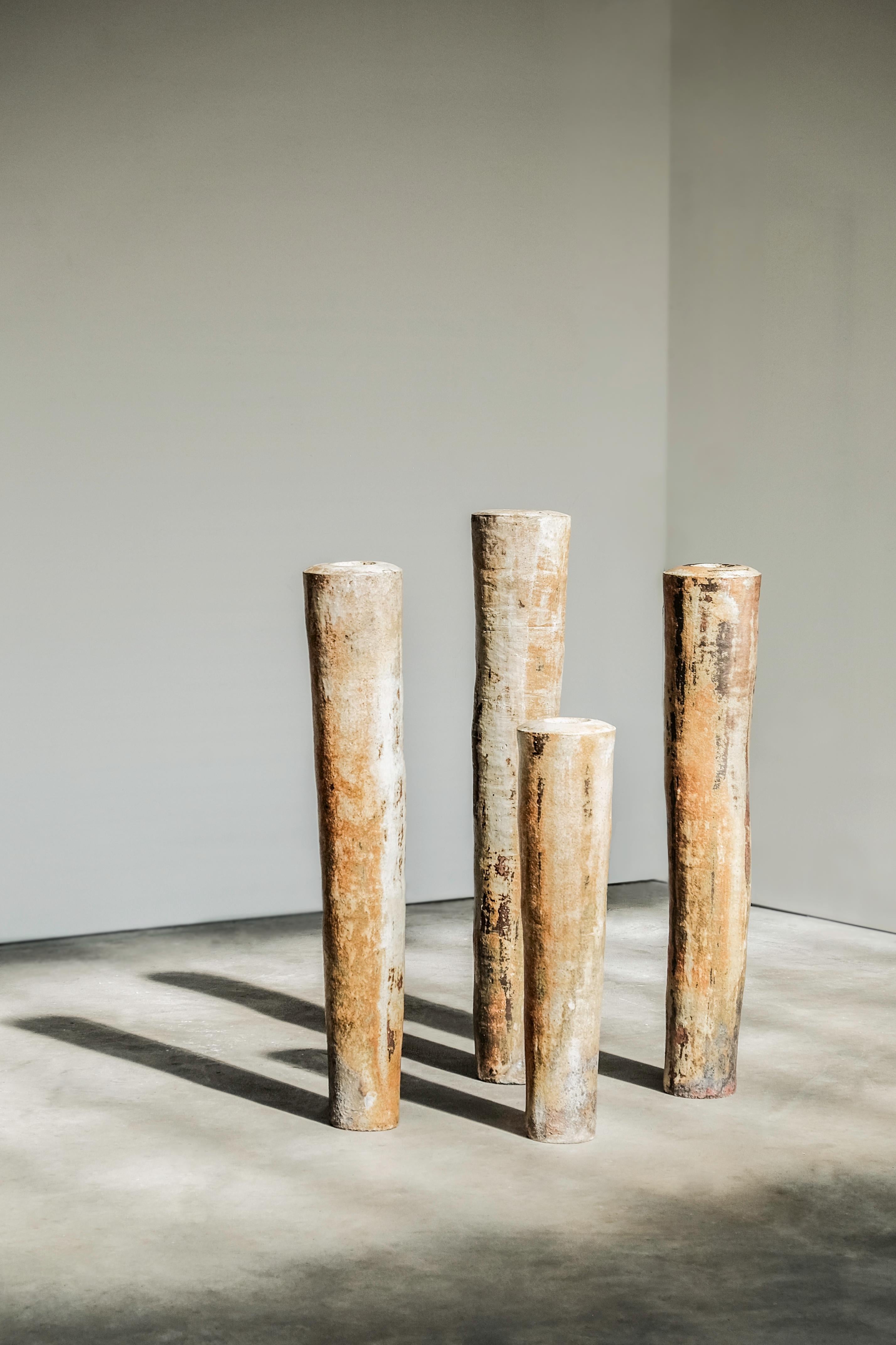 Contemporary abstract stoneware sculptures by Valéry Maillot, 2015.
Uniques Pieces, La Borne, France.
_______
Dimensions : (1) H 80 cm – (2) (3) H 112 cm – (4) H 123 cm
_______
Valéry Maillot's work consists in experimenting shapes and ways of