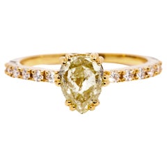 Contemporary ADGL Certified 1.15 Carat Light Fancy Yellow Pear Cut Diamond Ring