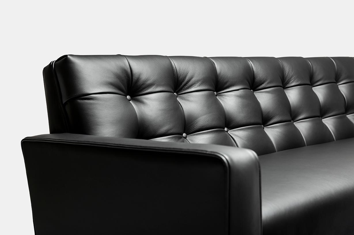 The Adoni Obsidian Sofa is a striking and beautifully prominent furniture piece. It features stunning biscuit tufting that demonstrates fine skill of contemporary craft. The leather give a soft textured feel with outstanding durability and colour