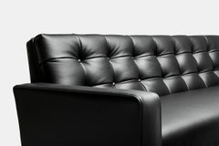 Contemporary Adoni Obsidian Black Leather Sofa with black waxed walnut feet