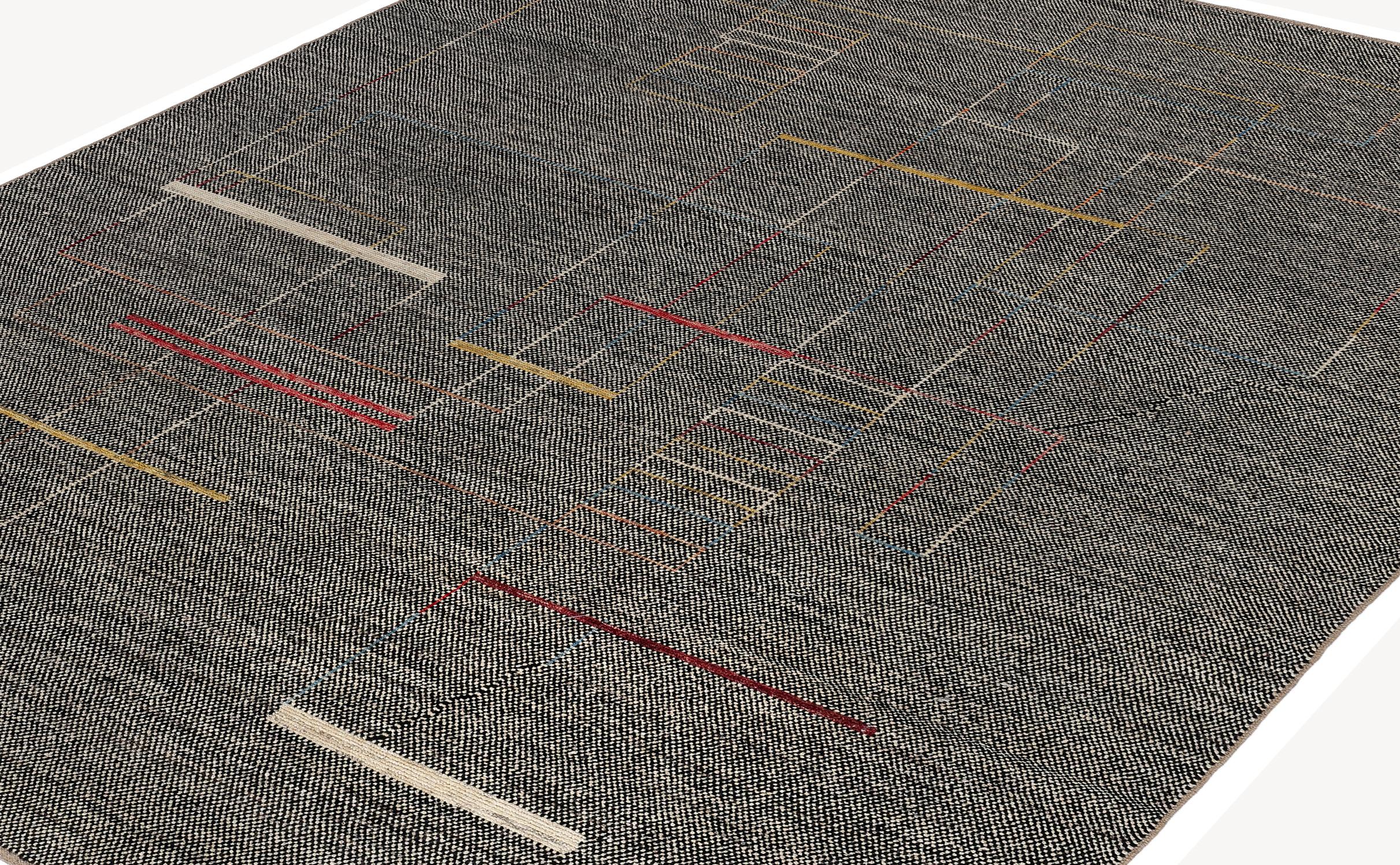 This contemporary Afghan rug is a masterful example of handwoven artistry, crafted with hand-spun wool and dyed using 100% natural vegetable pigments. Its minimalist design features a soft neutral palette accented with subtle linear motifs in ochre,