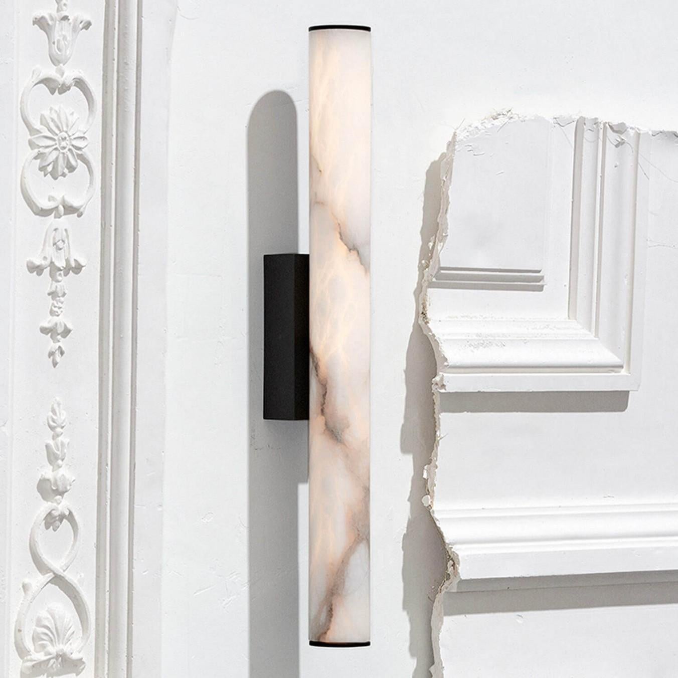 Contemporary Alabaster and brass wall sconce - Callisto by Garnier&Linker

Result from a research on cylindrical shape, CALLISTO collection seeks to highlight alabaster inside the most minimal brass structure. 

Available in glass version under the