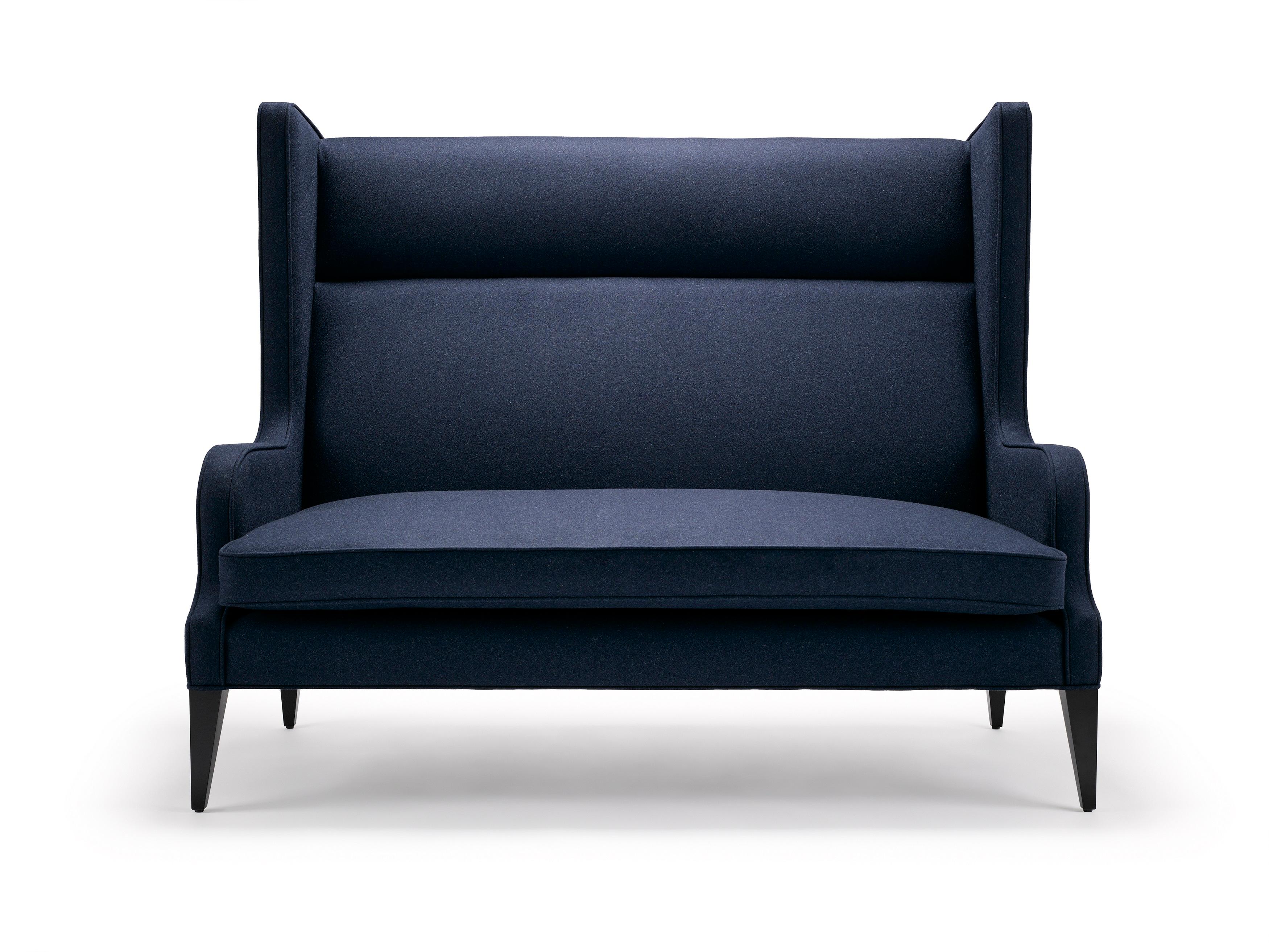 With its fluid lines and subtle angles, we have our Alae Wing Sofa.

Construction: Solid seasoned beech frame, with a sprung seat and webbed back with a feather and down wrapped CMHR foam seat cushion.

Each Stuart Scott piece is built by hand in