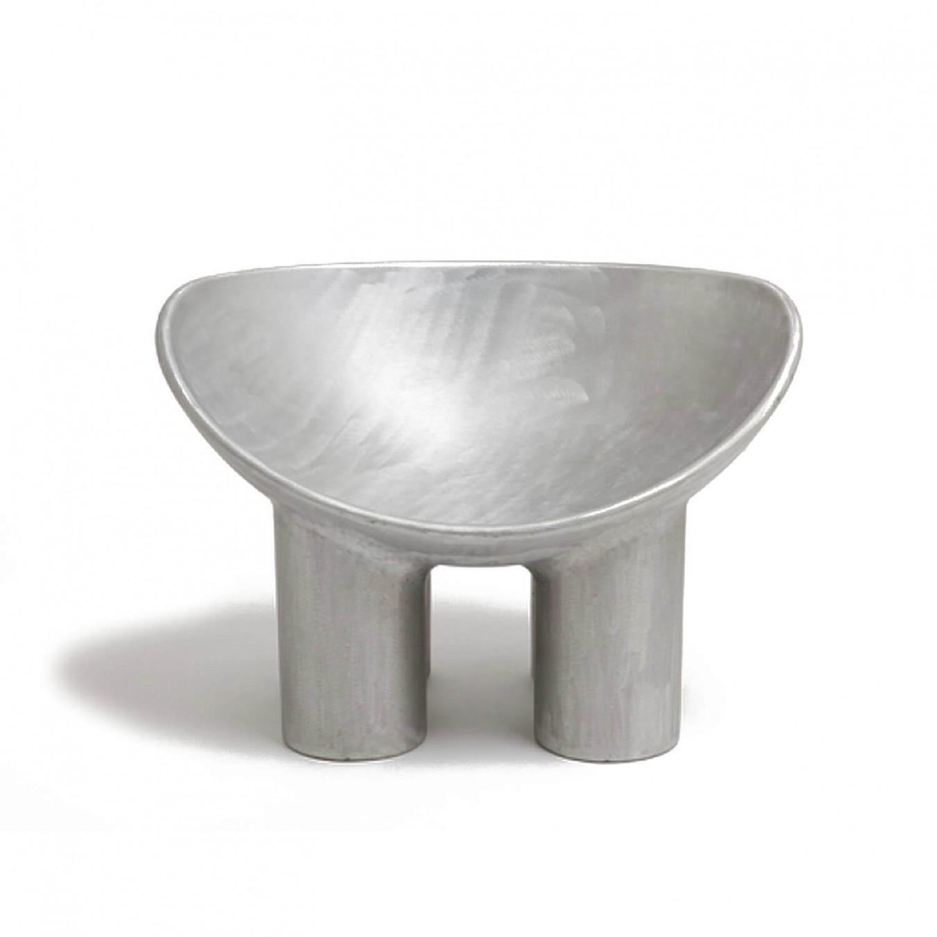 Design: Faye Toogood
Material: Aluminium
60 kg

The Roly Poly chair is the anchor piece of Faye Toogood’s Assemblage No. 4 collection. This scoop seated chair with four plump legs is made from material that suggests a certain rawness. Assemblage