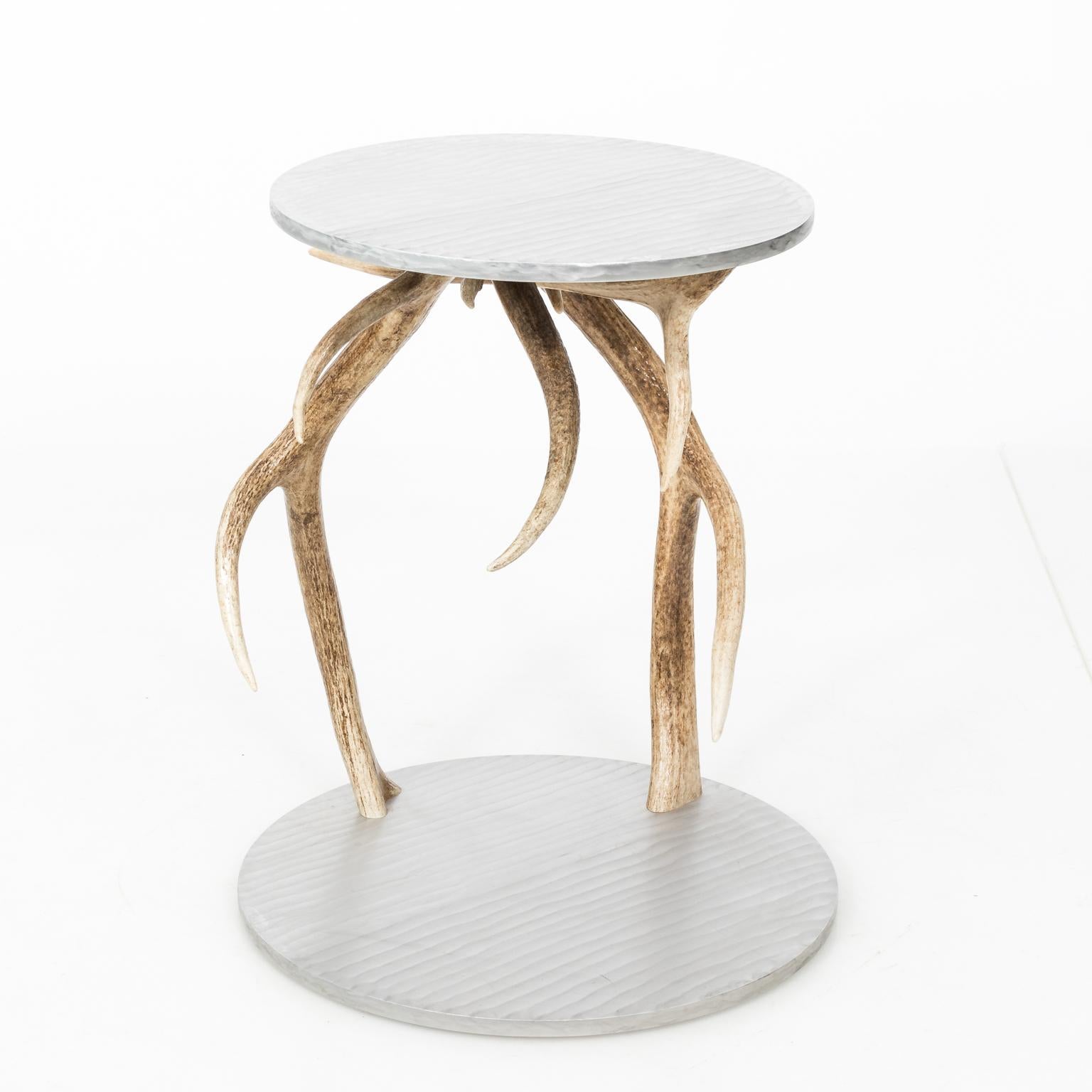 Custom made side table signed by artist Daniel S.Macphail with aluminium tabletop and base decorated with antlers, circa 2010.