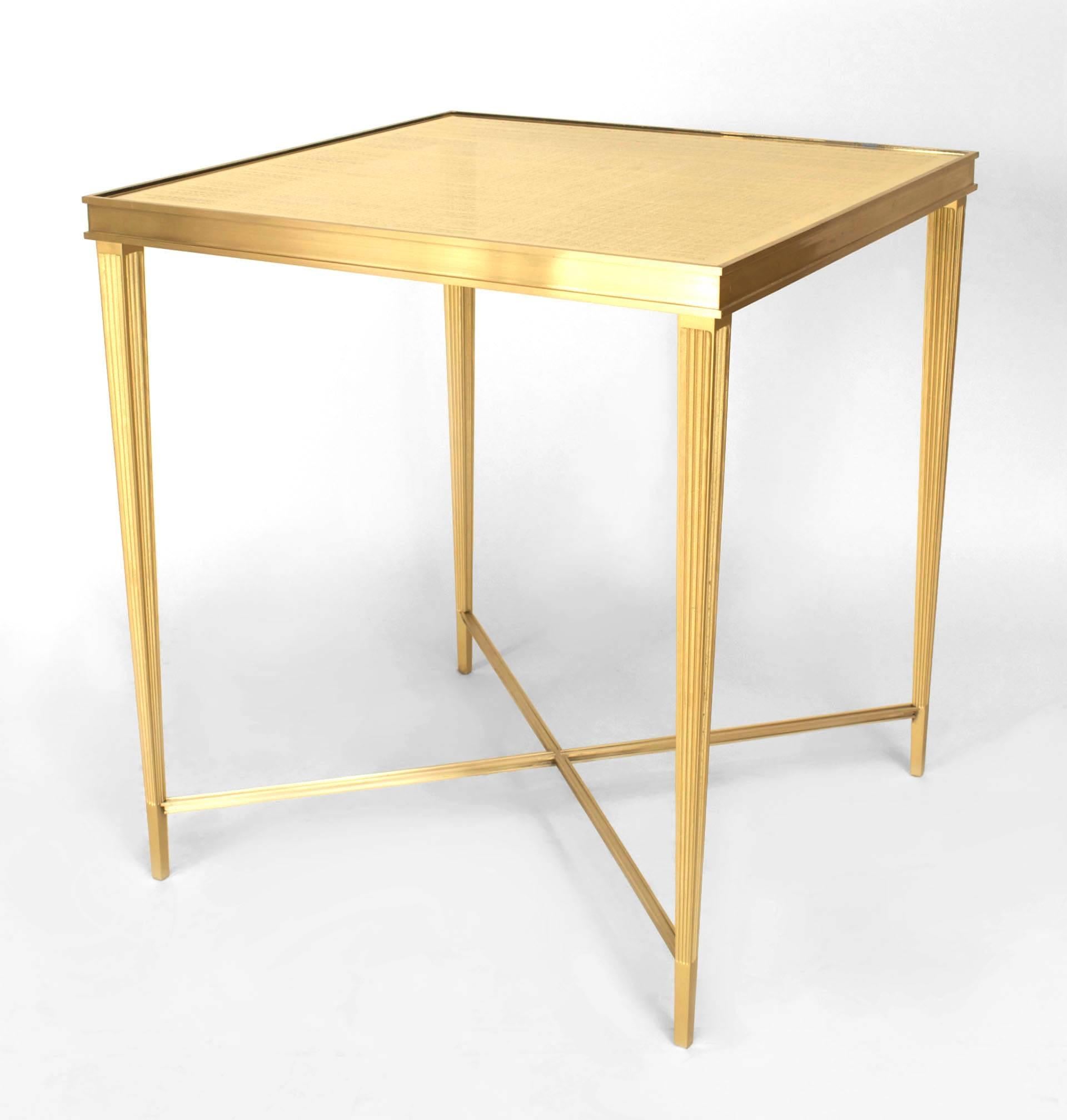 Louis XVI-style bronze striated square end table with a gilt √©glomis√© glass top (By MIRIAM ELLNER)
