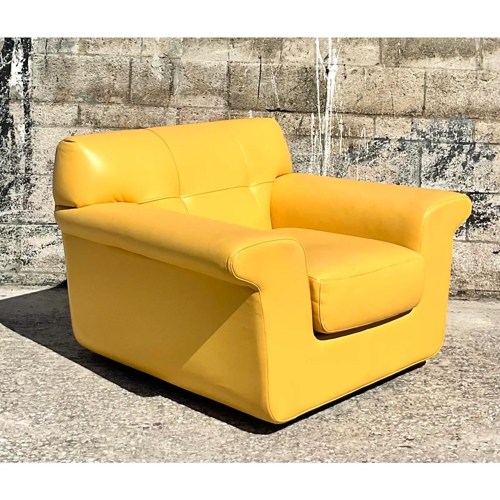 Fantastic vintage bright yellow leather chair. Made by the iconic American Leather. Beautiful Contemporary wide shape with a swivel base for extra relaxing. Tagged. Acquired from a Palm Beach estate.