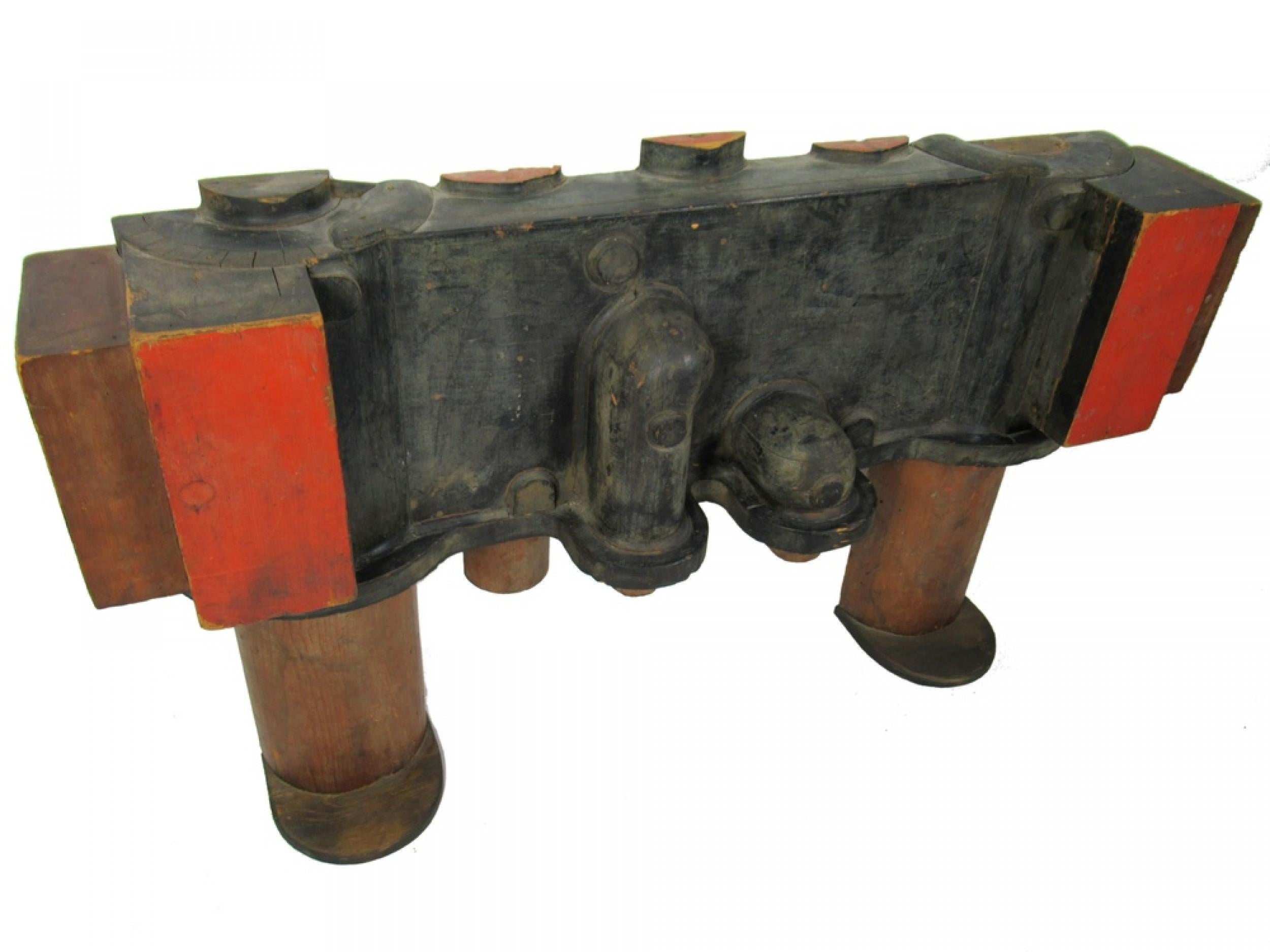 Contemporary American abstract sculpture constructed from industrial molds and painted wood.