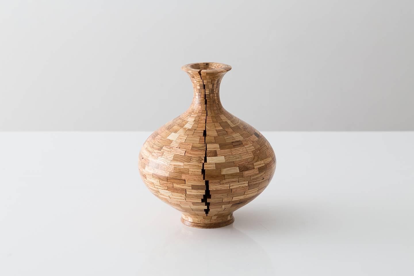 Part of Richard Haining's stacked Collection; this asymmetrical vessel utilizes reclaimed red and white oak. The salvaged wood off cuts were sourced from a variety of local Brooklyn wood shops, as well as from deconstructed turn of the century mill