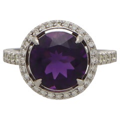 Contemporary Amethyst and Diamond Halo Ring Set in Platinum