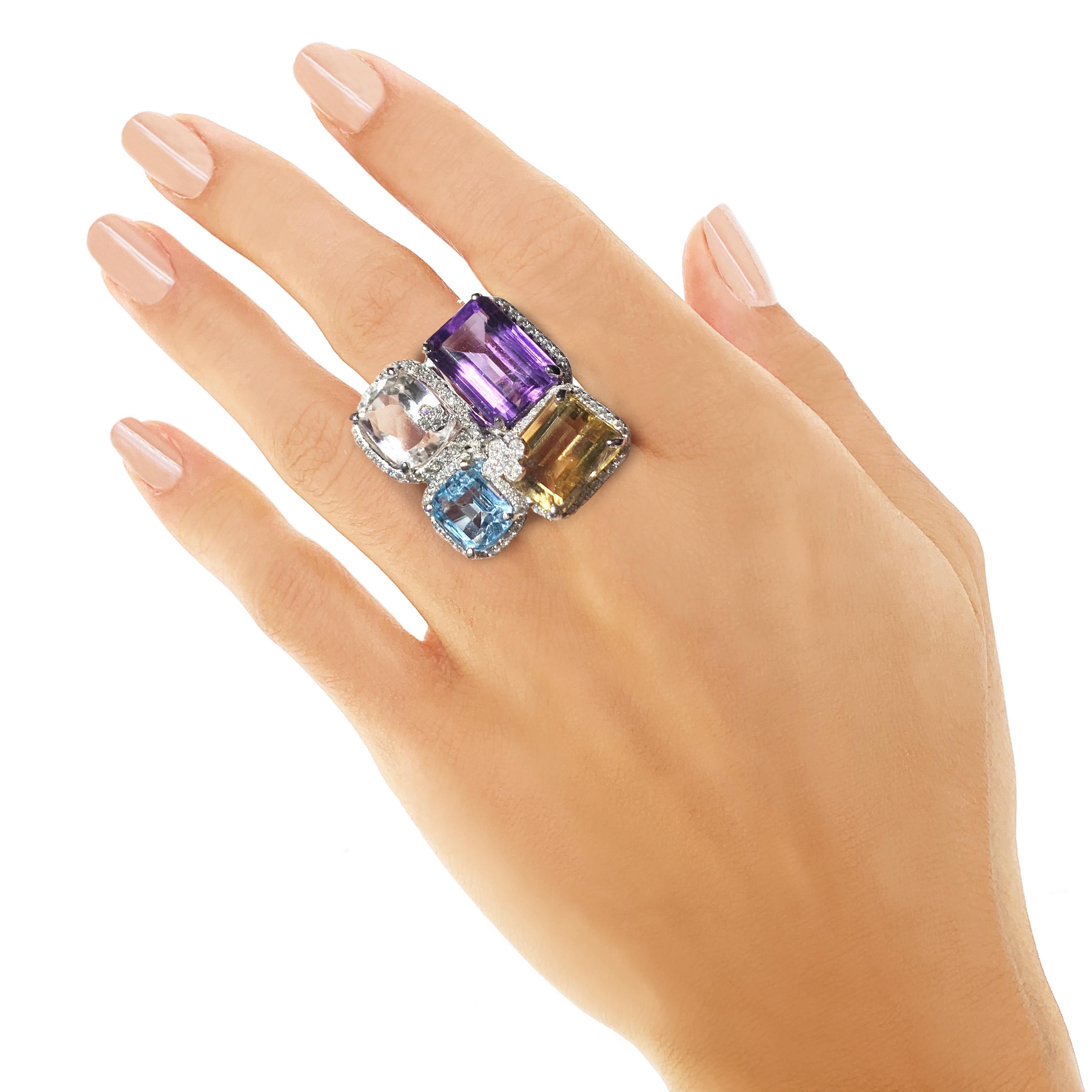 Rosior by Manuel Rosas Contemporary Cocktail Ring made in White Gold and set with:
- 1 Amethyst with 17,5 ct;
- 1 Citrine Topaz with 14,20 ct;
- 1 Kunzite with 10,10 ct;
- 1 Topaz with 7,50 ct;
- 134 G-VVS Diamonds with 2,16 ct.
This unique piece is