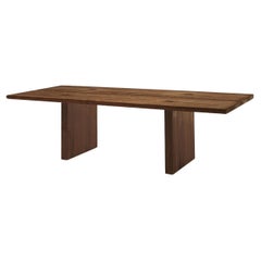 Tavolo contemporaneo e minimalista realizzato a mano in noce americano