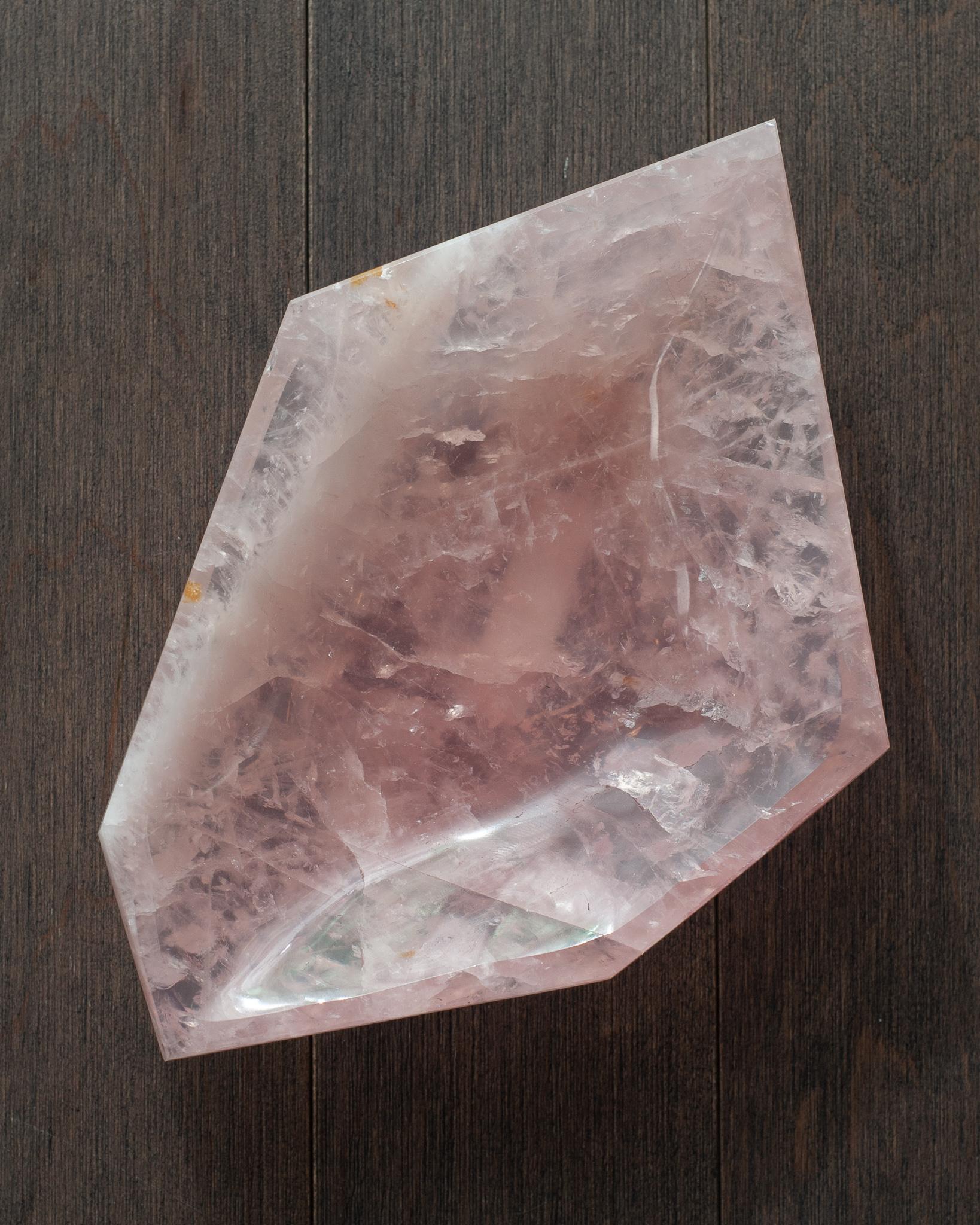 A stunning contemporary vibrant pink rose quartz bowl with angular faceted shape. Invite the healing energy of rose quartz into your interior with a beautiful and functional bowl. Each is cut like a gemstone and is a saturated shade of pink.