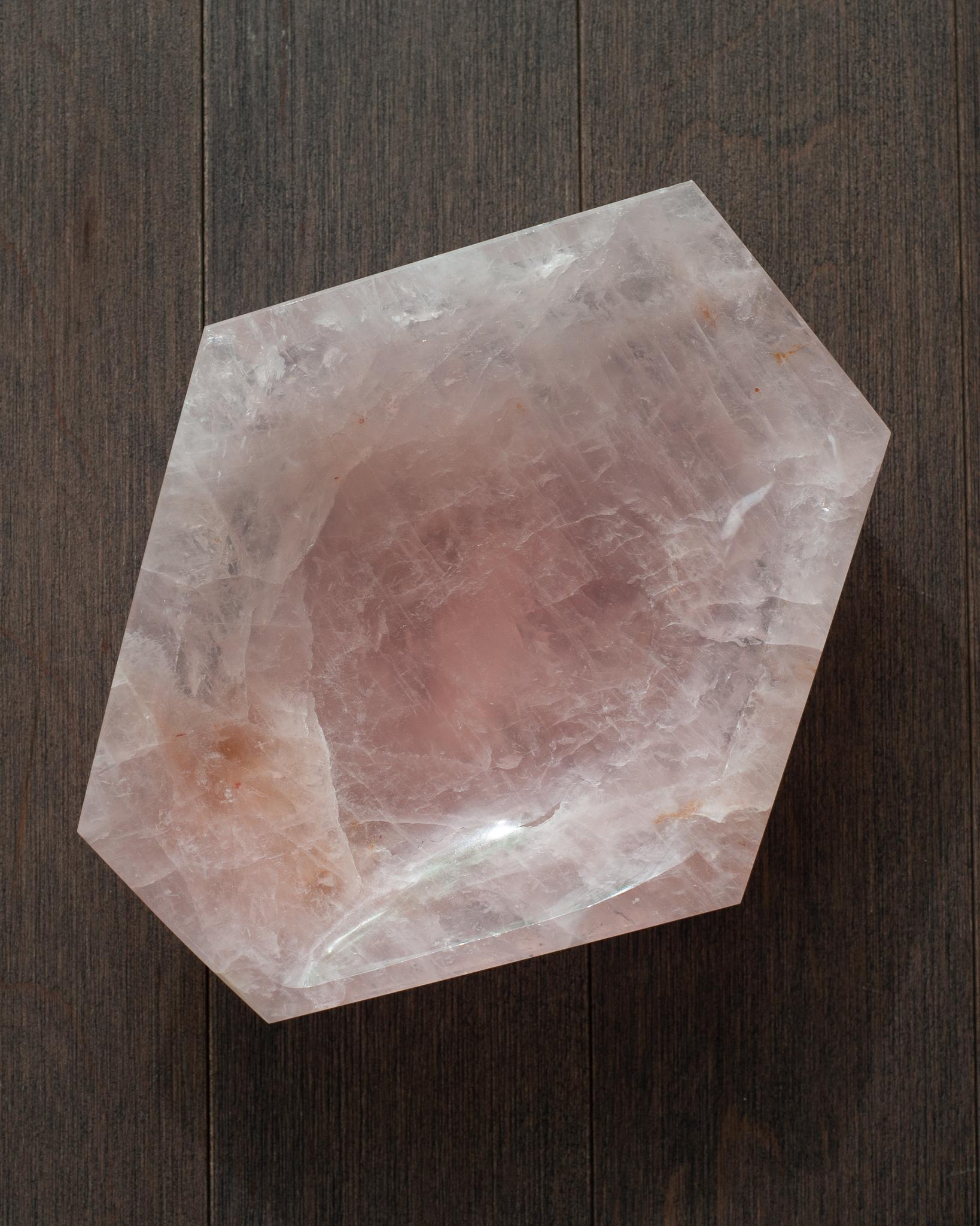 A stunning contemporary vibrant pink rose quartz bowl with angular faceted shape. Invite the healing energy of rose quartz into your interior with a beautiful and functional bowl. This piece is cut like a gemstone and is a saturated shade of pink.