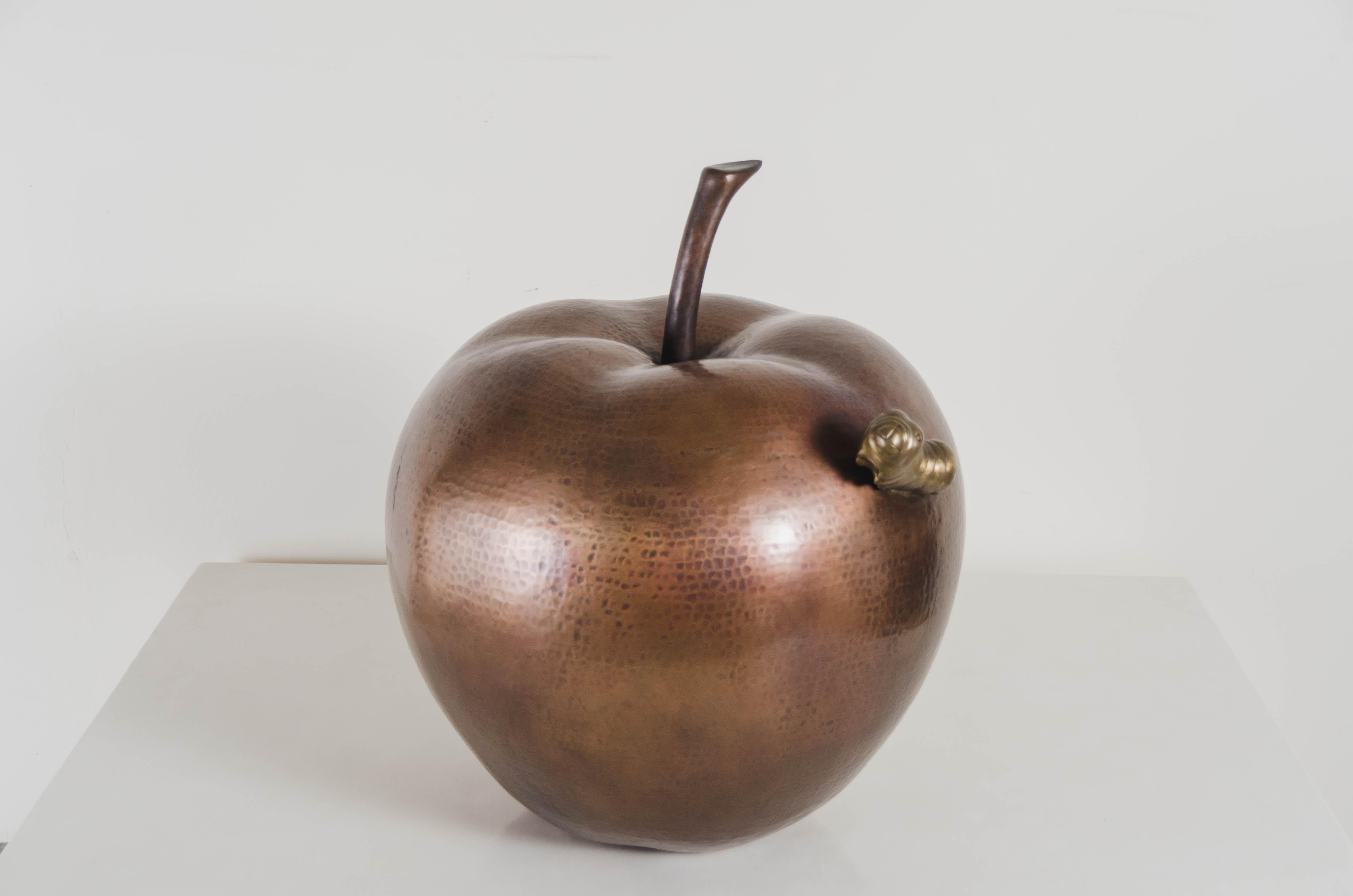 Apple with worm sculpture
Antique copper
Brass
Hand Repoussé
Limited Edition
Each piece is individually crafted and is unique. 

Repoussé is the traditional art of hand-hammering decorative relief onto sheet metal. The technique originated
