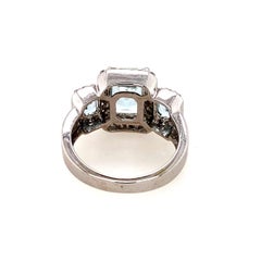 Contemporary 2.88 CTW Emerald-Cut Aquamarine and Diamond Halo White Gold Ring