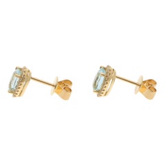 Contemporary Aquamarine and Diamond Halo Stud Earrings in Yellow Goldc